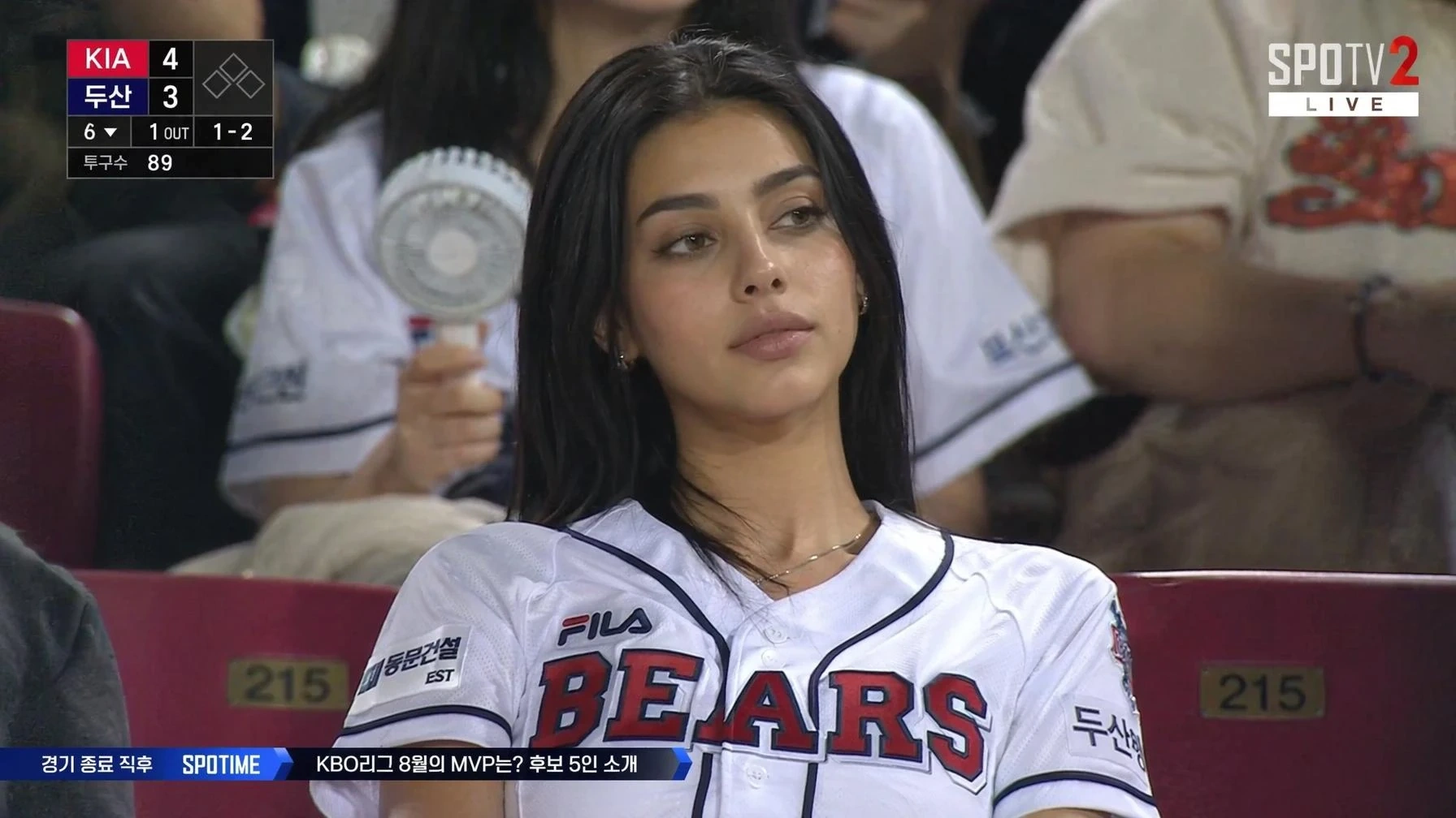 KBO broadcast crowd close-up of a fan in the stadium seats