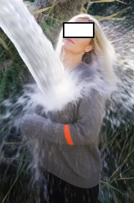 person with water splash, blurred face