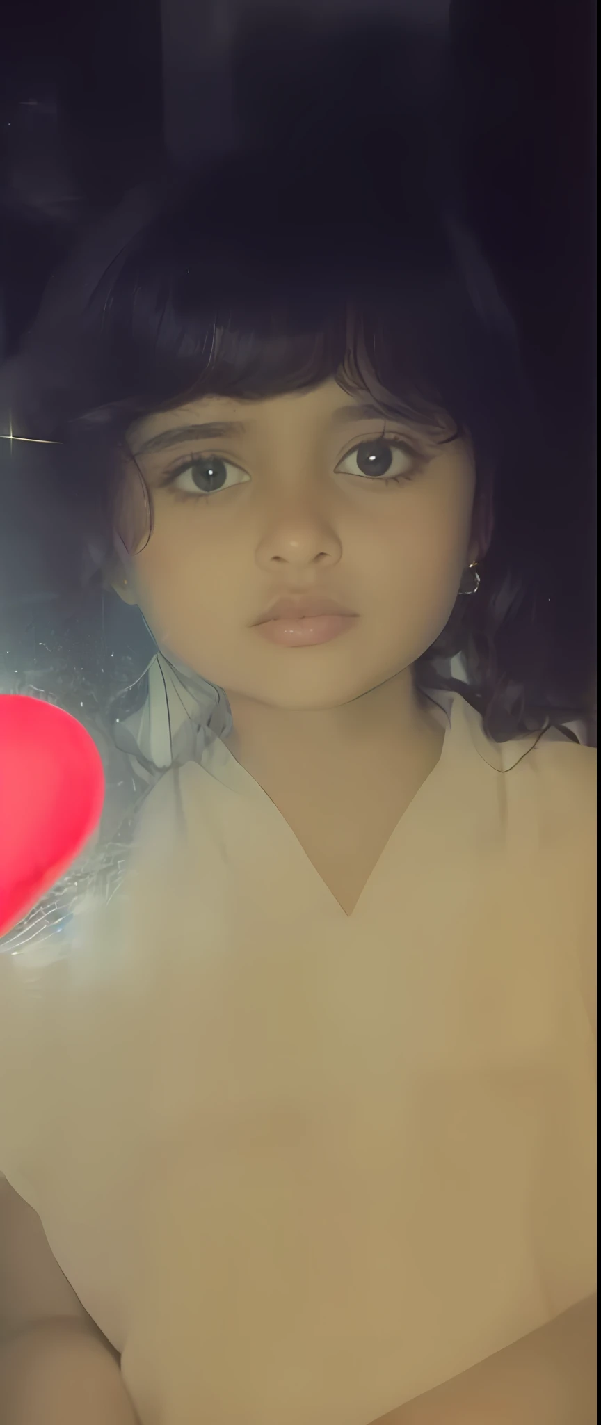 there is a young girl holding a red heart in her hands, very very low quality picture, innocent look, innocent face, old picture, photo of the girl, with cute - fine - face, very very low quality, very very very beautifull face, with lovely look, very clear picture, arab ameera al taweel, sweet and innocent