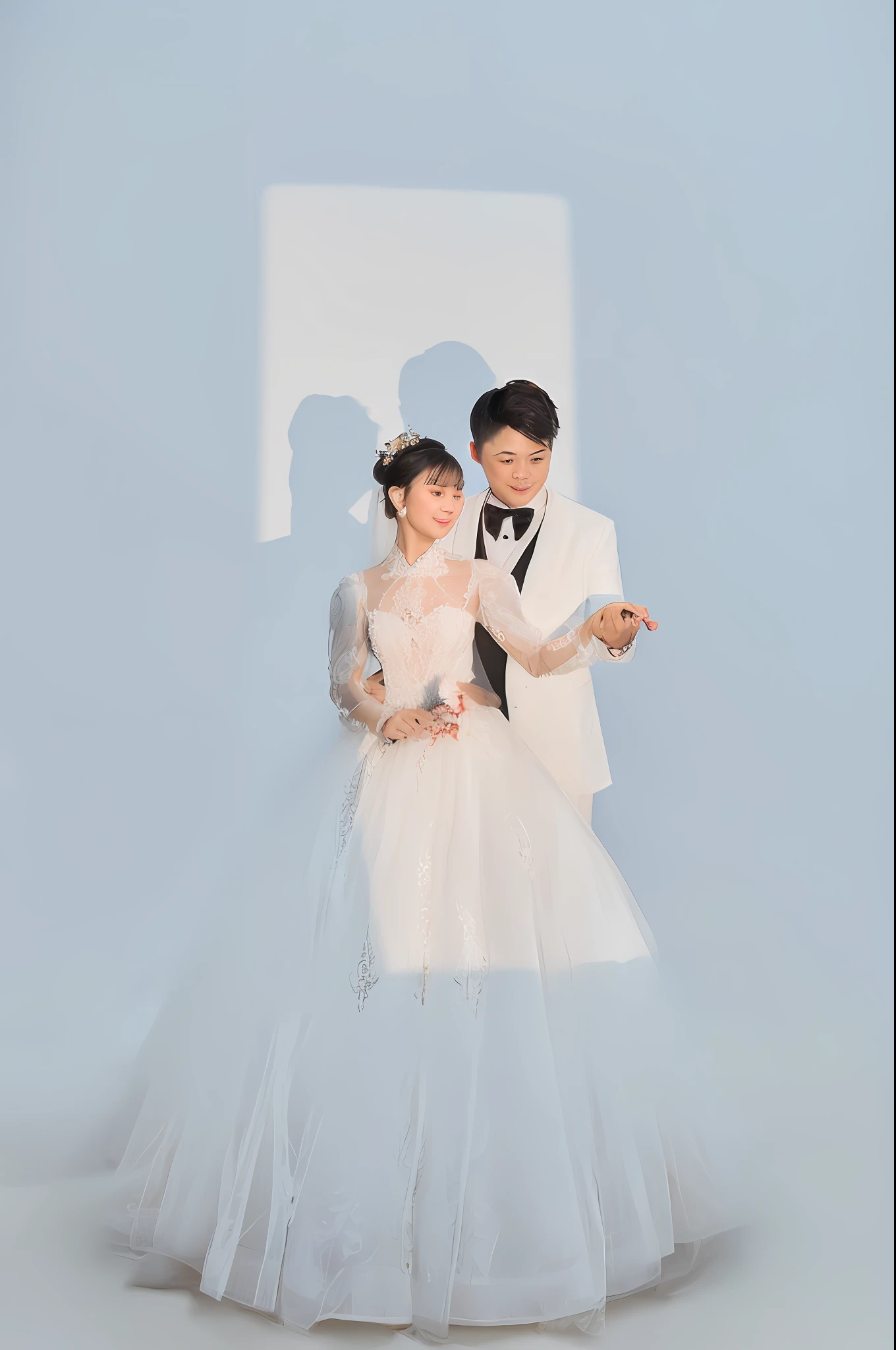 Bride and groom pose for group photo in white tulle, in front of white background, wedding photo, cute couple, O'Day, couple pose, Jia