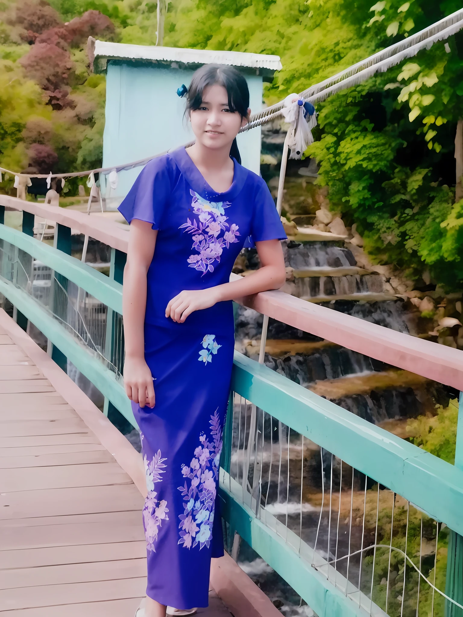 arafed woman in a blue dress standing on a bridge, nivanh chanthara, photo taken in 2 0 2 0, traditional dress, around 1 , colored photo, dang my linh, traditional art, in a blue qipao, 3 0 years old woman, 30 years old woman, potrait, connected with hanging bridge!!