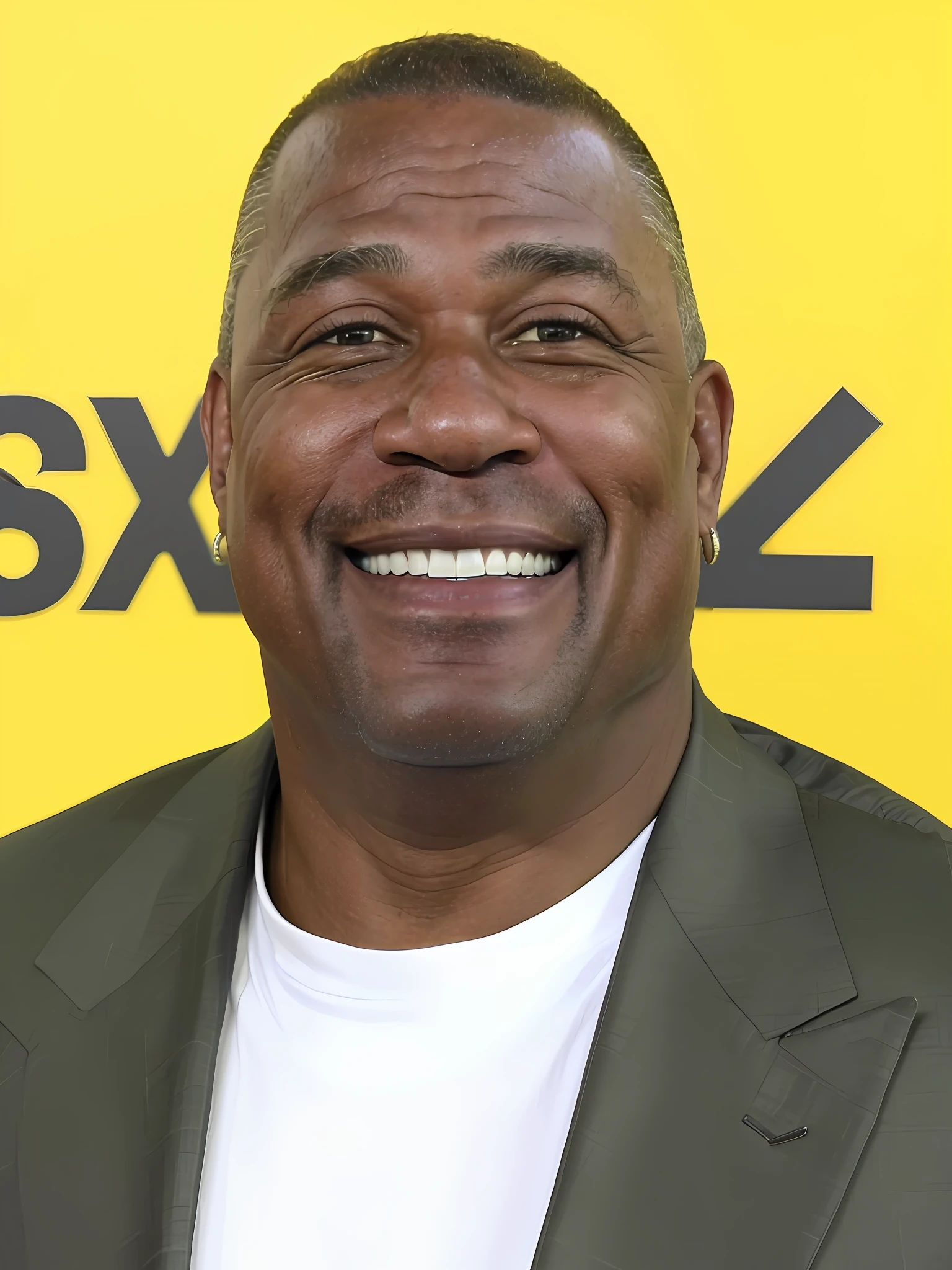 arafed man in a suit smiling at the camera, taken in the early 2020s, huell babineaux, gary chalk, photo of a 50-year-old white man, taken in the late 2010s, looking off to the side, a man wearing a black jacket, jerry, oscar winning, george floyd, actor