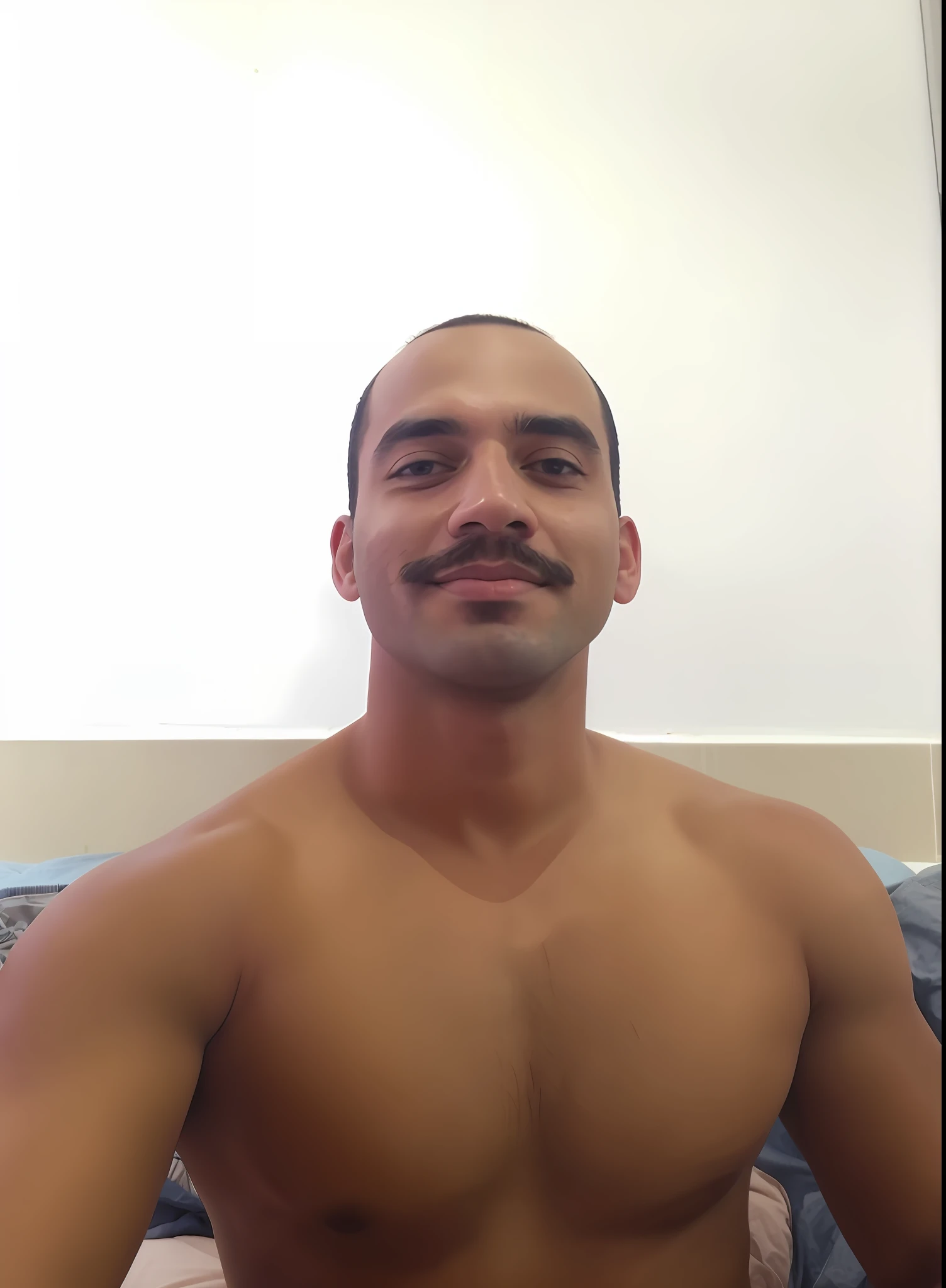 There is a man who is sitting, 2 3 years, 2 8 years, 2 9 years, 3 2 years, 2 4 years, no mustache