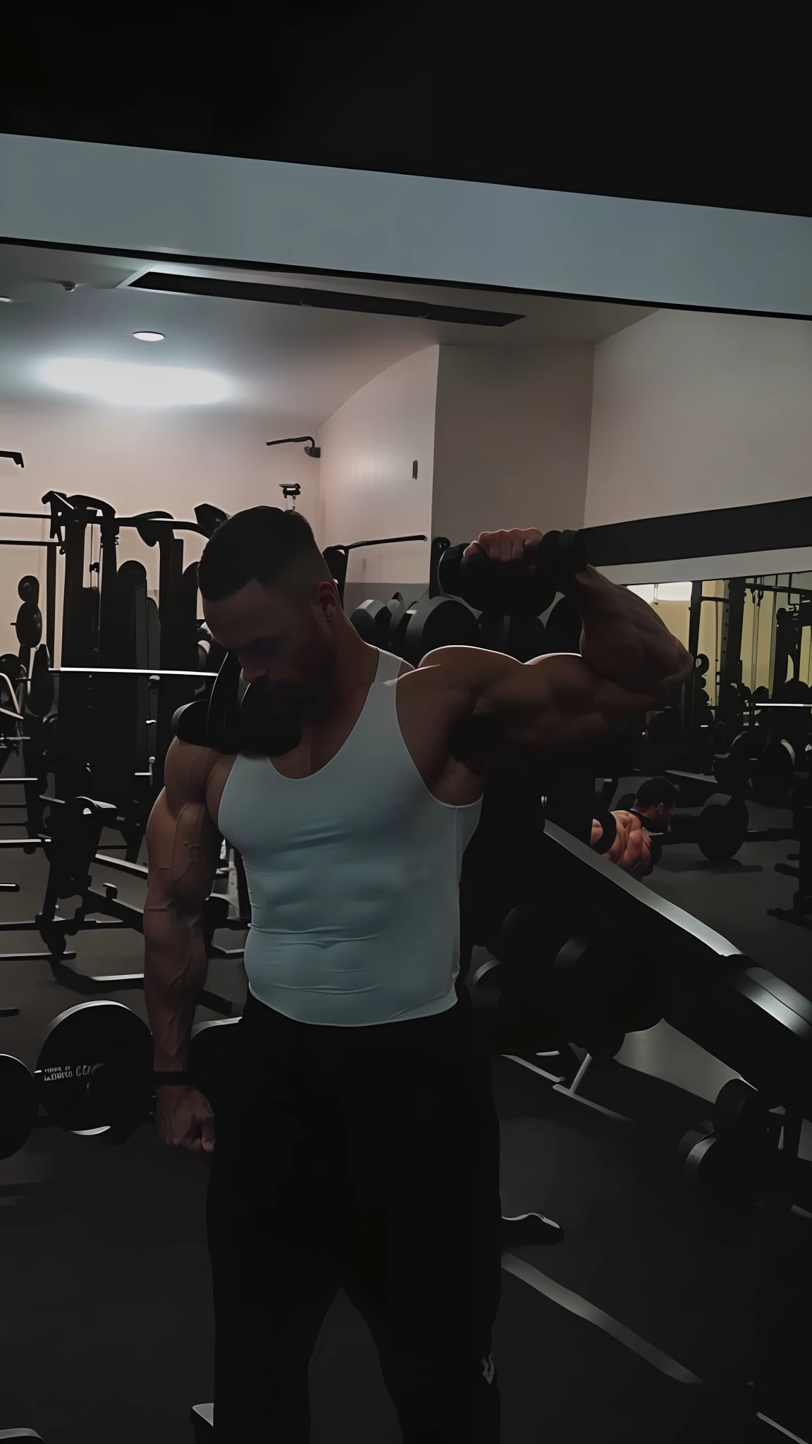 there is a man that is standing in a gym , working out, fit pic, in a gym, upper body!!, shoulders can be seen, muscles, lean but muscular, low quality photo, in shape, muscular!!!, posing and flexing, fitness body, in good physical shape, musculine, slender and muscular build, muscular!!