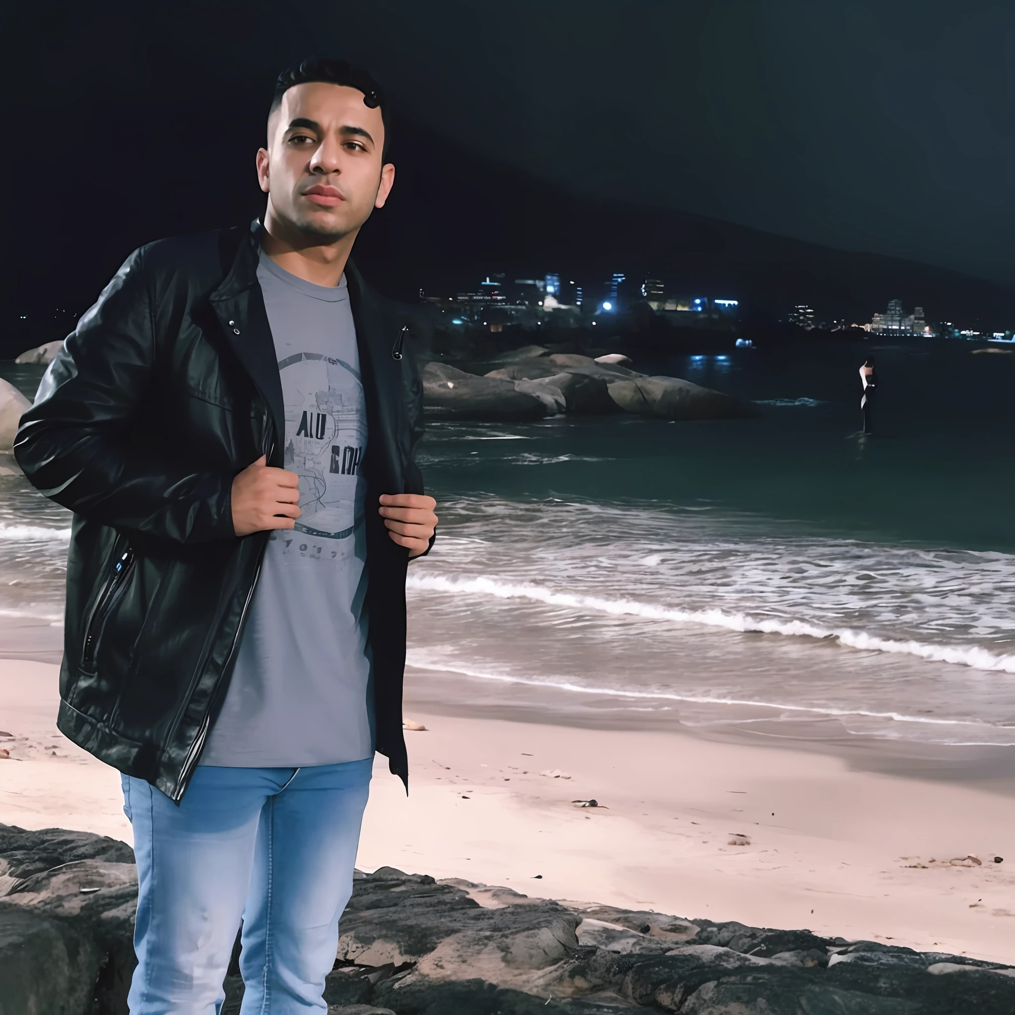 arafed man standing on a beach at night with a city in the background, caio santos, the ocean in the background, ocean in the background, album photo, joel torres, mohamed chahin, riyahd cassiem, profile picture 1024px, by Július Jakoby, david rios ferreira