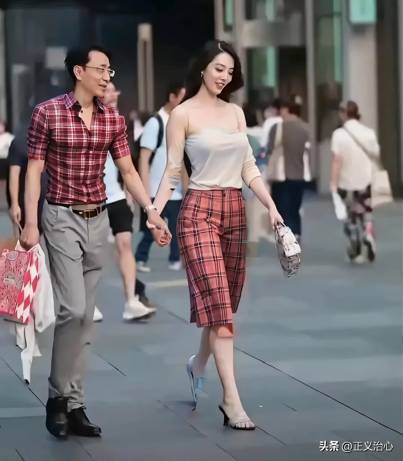 Couple wearing beautiful fitted plaid clothes