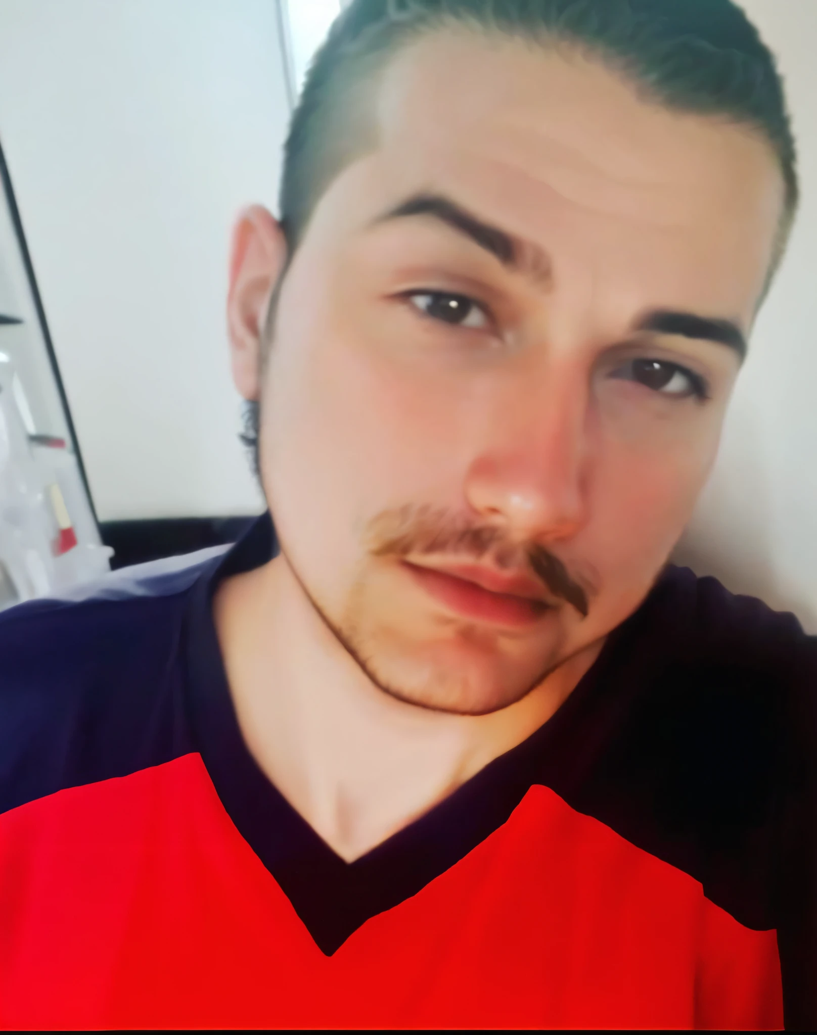 there is a man with a mustache and a red shirt, 2 7 years old, 2 8 years old, twitch streamer / gamer ludwig, 2 9 years old, very very low quality picture, 2 3 years old, around 1 9 years old, profile image, taken in the early 2020s, andres rios, 3 2 years old