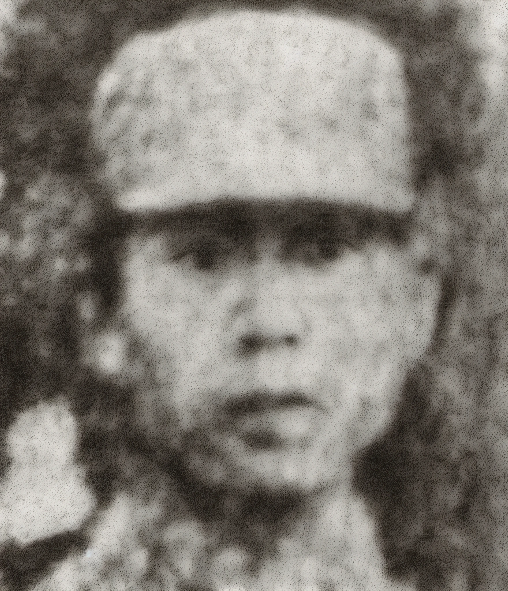 Photo of a man in a hat, very well-known photo, face in focus 1 8 9 0s extreme, rare photo, grainy black and white photo, close-up of face, close-up of face, artist unknown