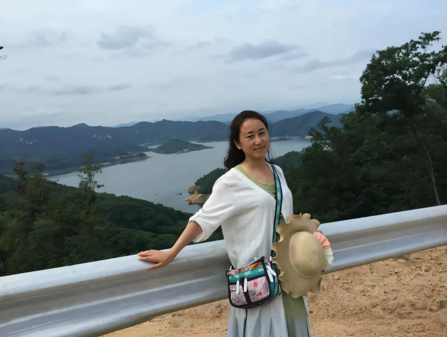 arafed woman standing on a road with a hat on her shoulder, sangsoo jeong, shin min jeong, with mountains in the background, inspired by Kim Jeong-hui, with mountains in background, jiyun chae, korean woman, beautiful south korean woman, xintong chen, kwak ji young, 30 years old woman, heonhwa choe
