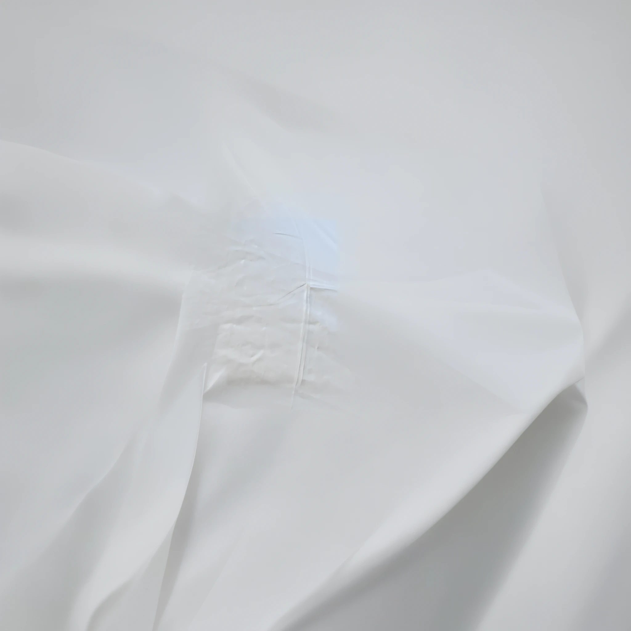 there is a white umbrella with a black handle on a street, white splendid fabric, seams stitched tightly, fake hidden detail, white cloth, white tablecloth, white sheets, double layer fold over hem, white space in middle, very long white cloak, white cloth in wind shining, white backdrop, white loincloth, large white border, white tracing