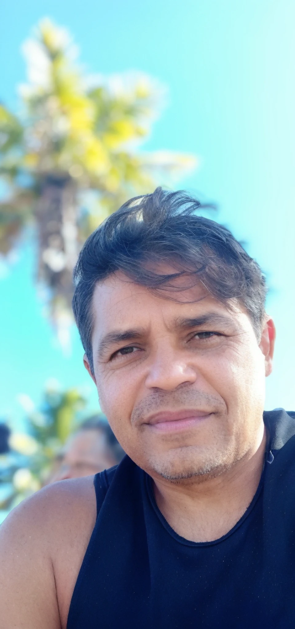 there is a man that is sitting down with a banana, 45 years old men, 4 0 years old man, 5 0 years old man, jose miguel roman frances, luis nieves sr, david rios ferreira, (38 years old), juan diaz canales, 8k selfie photograph, taken in the early 2020s, 4 5 yo