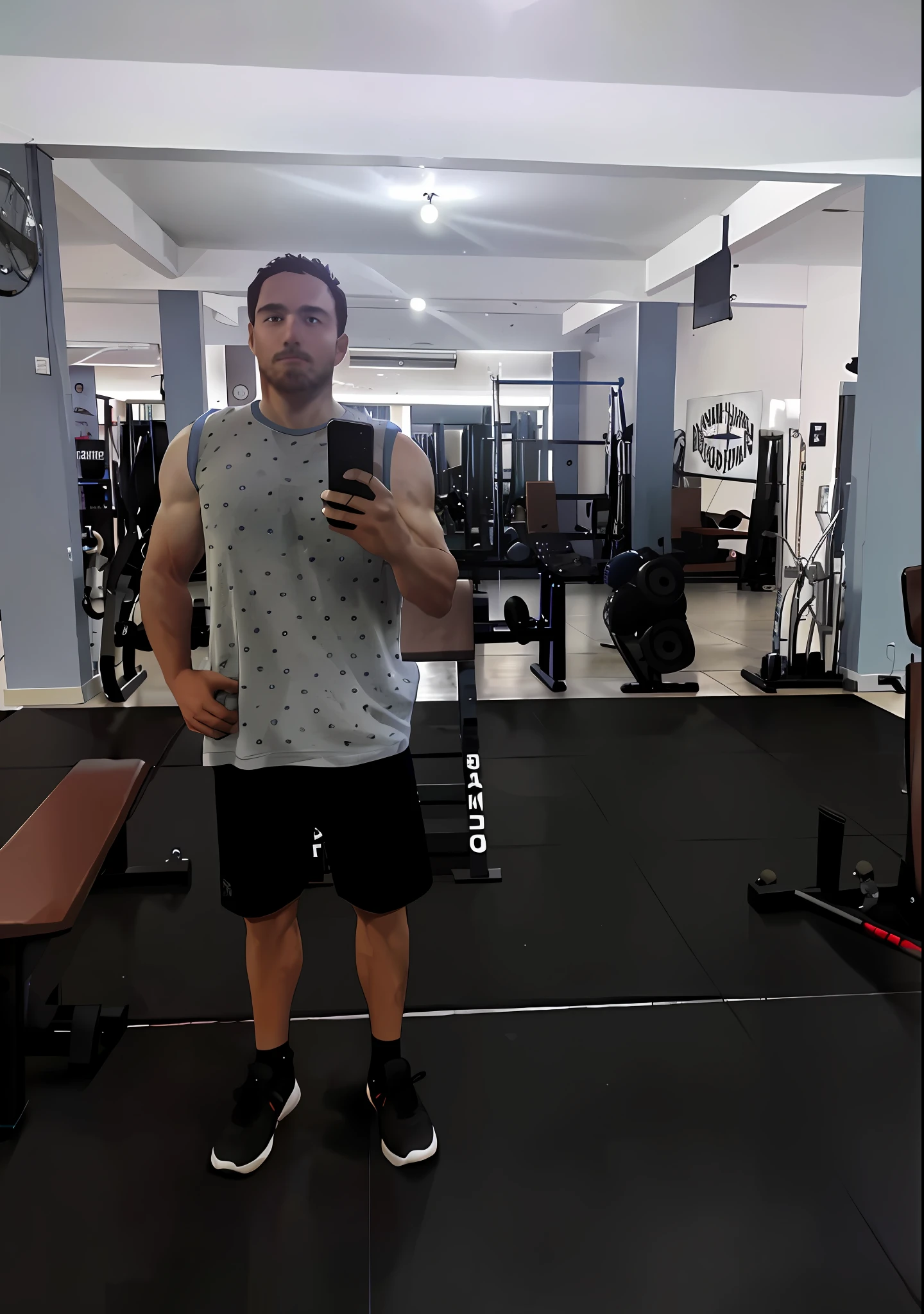 there is a man standing in a gym with a cell phone, in a gym, fit pic, working out, full body!, shoulders can be seen, in good physical shape, 2 7 years old, full body picture, 2 8 years old, in shape, 2 9 years old, 2 3 years old, he is! about 3 0 years old