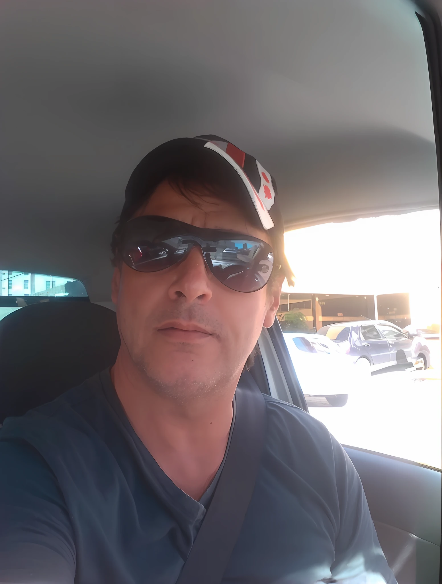 arafed man in a car with sunglasses and a baseball cap, david rios ferreira, 45 years old men, 4 5 yo, beto val, carmelo blandino, photo of a 50-year-old white man, icaro carvalho, 38 years old, 4 0 years old man, by Antônio Parreiras
