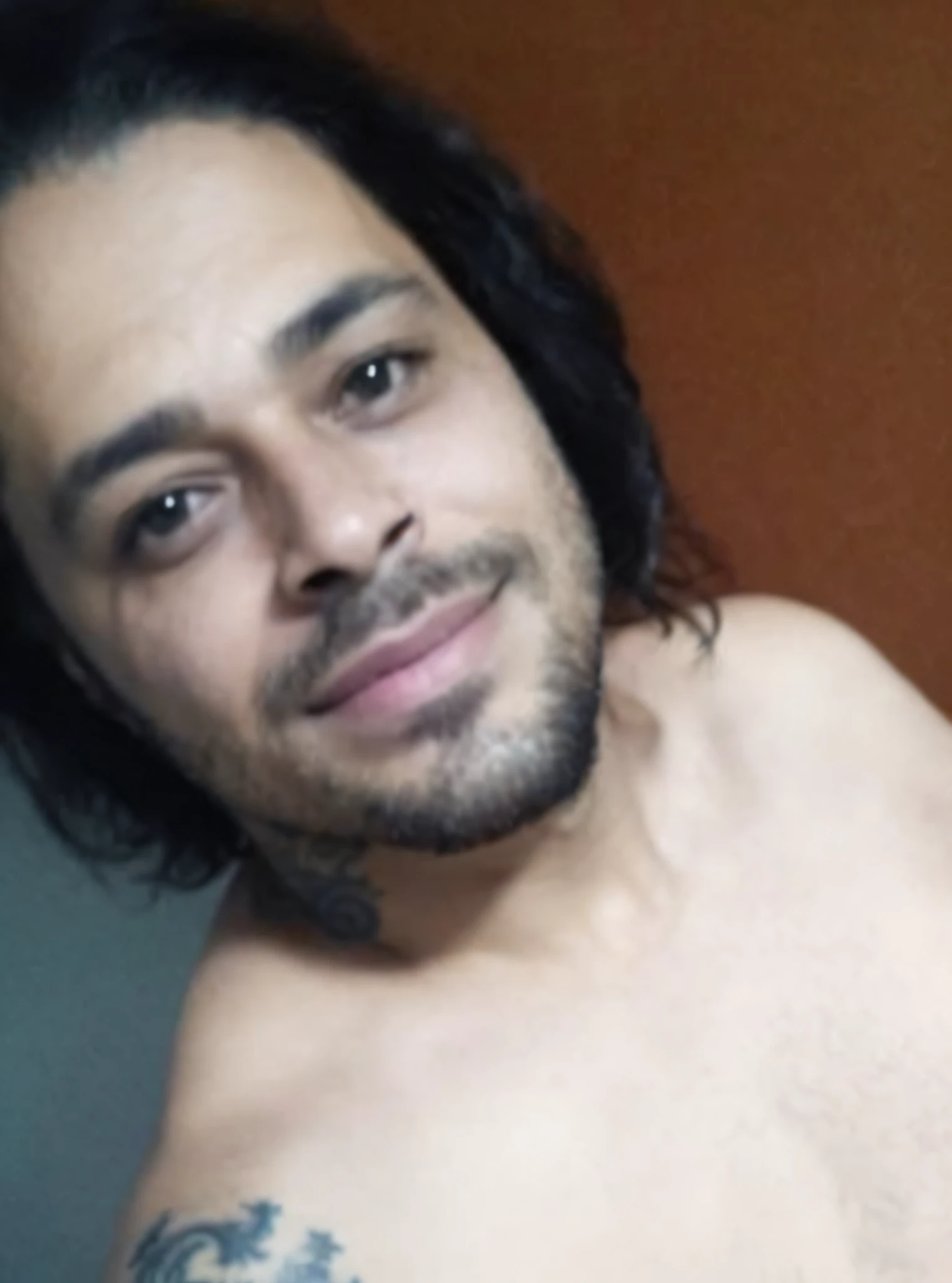 there is a man with a tattoo on his chest and a tie, david rios ferreira, miguel iglesias, andrea rocha, caio santos, carmelo blandino, andres rios, icaro carvalho, 4 0 years old man, alejandro, he is! about 3 0 years old, danilo torres, he is 3 5 years old, victor maristane
