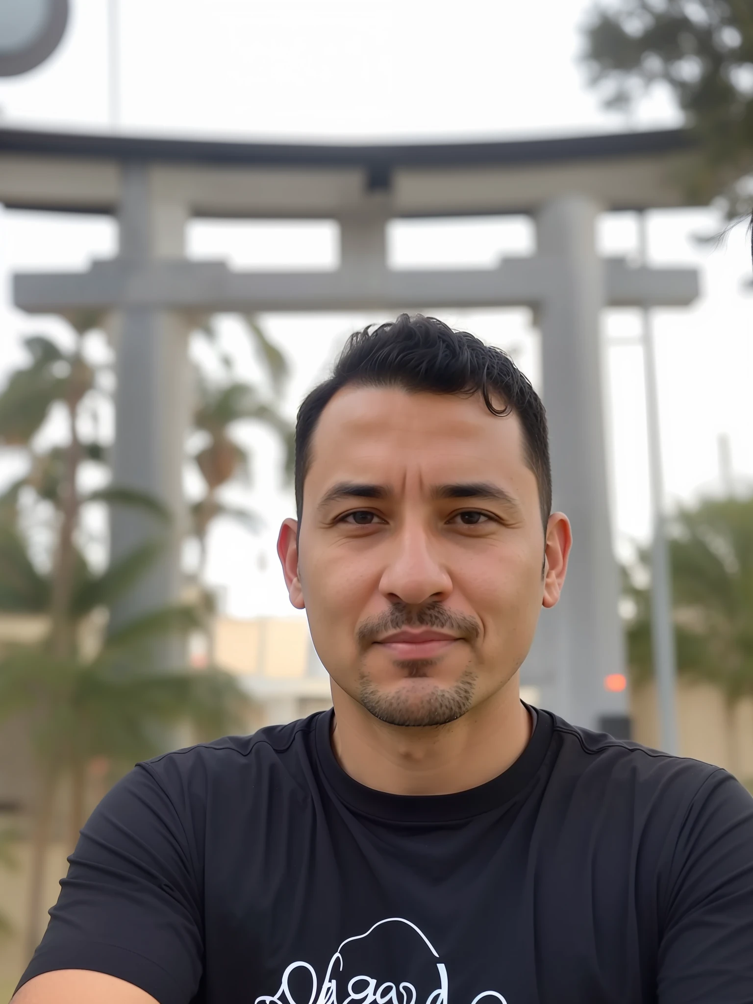 arafed man in black shirt sitting in front of a large structure, 8k selfie photograph, 4 0 years old man, taken in the early 2020s, 38 years old, 3 , reddit post, headshot profile picture, inspired by Kanō Naizen, profile picture, profile image, avatar image, 45 years old men