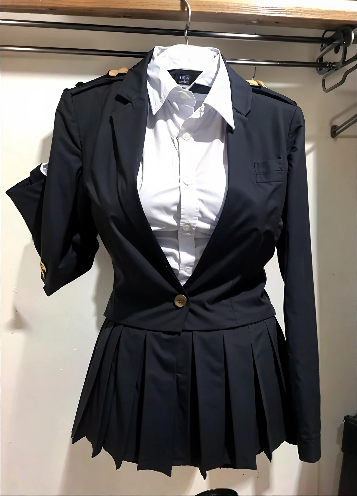 hanger school uniforms in closet raise their sleeves as if invisible girl wear it, school uniforms swells as if possessed by invisible girls, school uniforms have huge breasts, (((((no humans))))), (headless), faceless, invisible girls, (hanger), (in closet), hand on hip, (masterpiece), ((invisible)), huge breasts, very short skirt