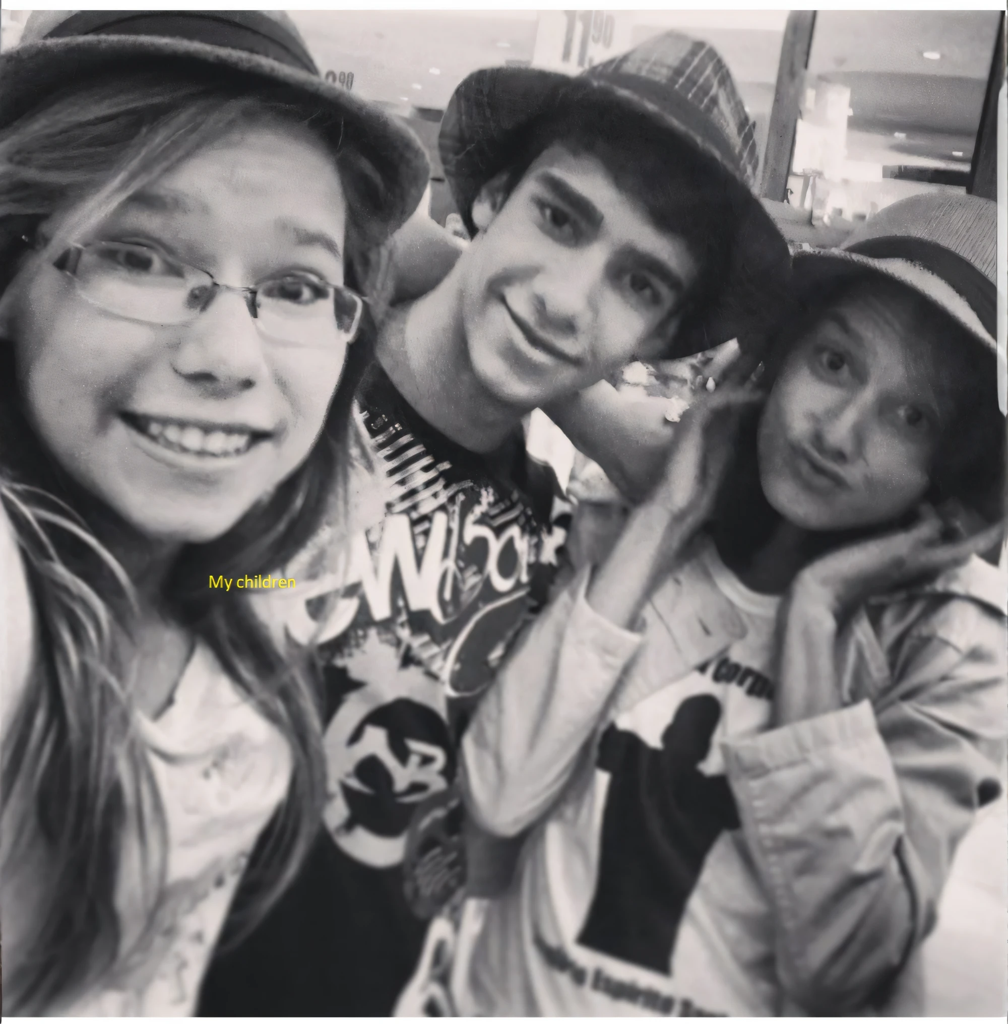 there are three people posing for a picture together in a black and white photo, desaturated!!, grainy picture, desaturated!, old picture, very grainy, with wart, at a mall, grainy vintage, grainy monochrome photo, roomies, adrien girod, grainy photo, grainy black-and-white photo, young!!!