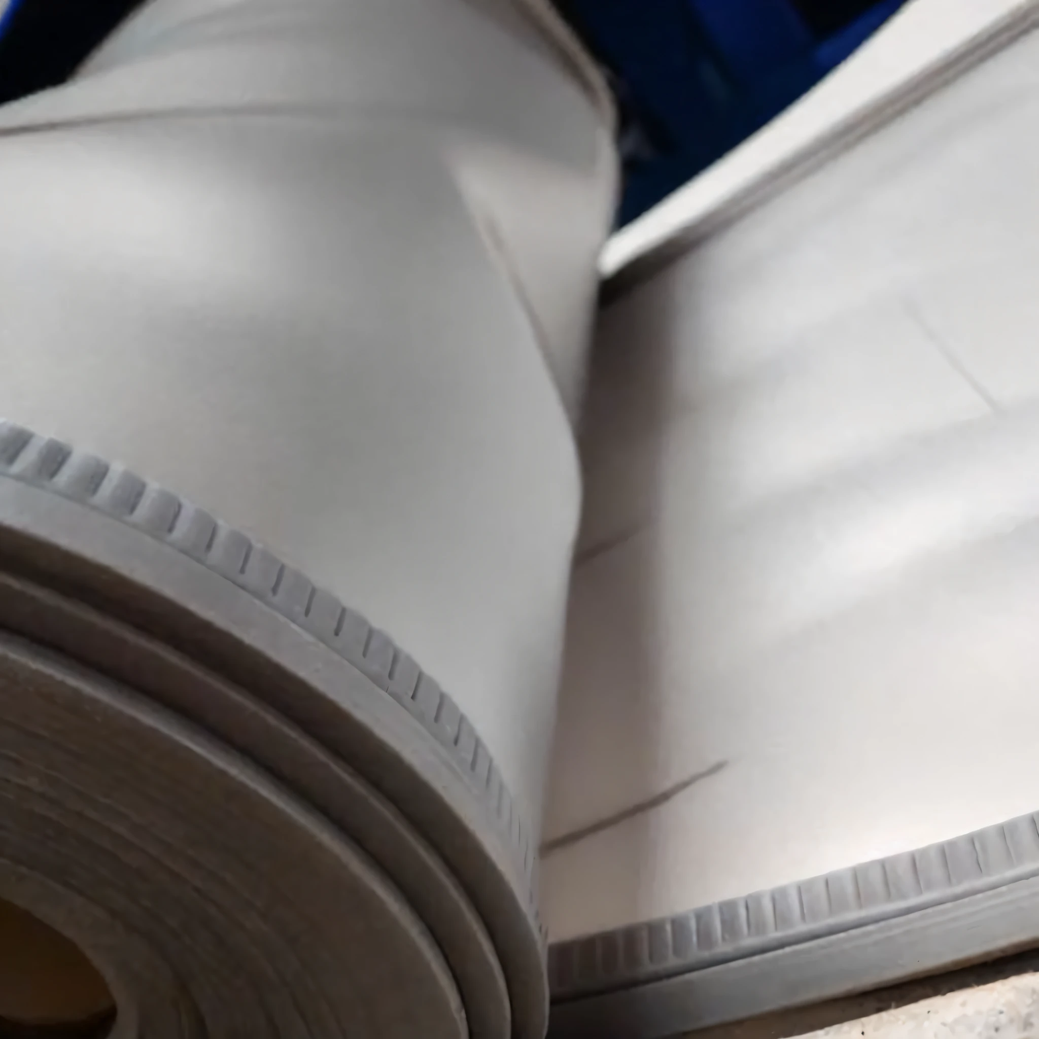 there is a person wearing white shoes and a blue shirt, wrapped thermal background, ldpe, high quality paper, pvc, soft white rubber, soft vinyl, vinyl material, large white border, white splendid fabric, white john berkey armor panels, diy, reflective material, profile close-up view, white plastic, 3 d white shiny thick, 8 0 0 mm