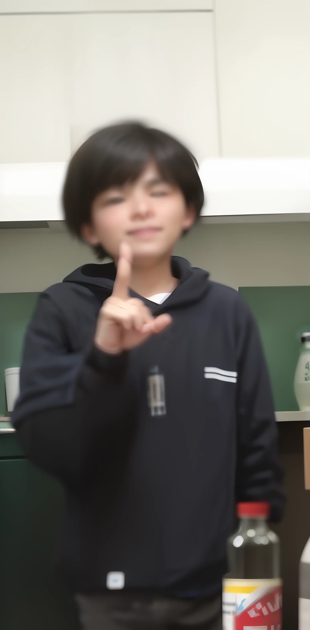there are two people standing in a kitchen with a bottle of soda, blurry face, 1 7 - year - old boy thin face, blurry image, blurred face, obscured face, very very low quality picture, blurry footage, detailed unblurred face, highley detailled face, distorted photo, without nose, very blurry, distorted pose, grainy footage