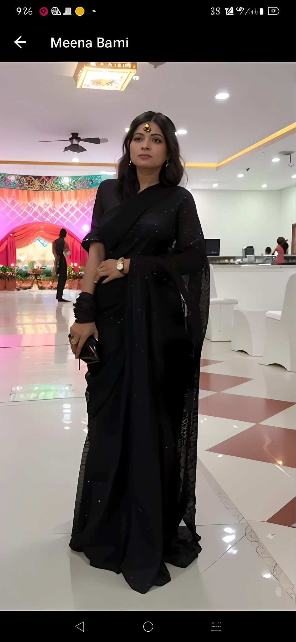 a woman in a black sari standing in a room, wearing sari, dressed in a sari, wearing a sari, candid picture, candid photo, with lovely look, 3 0 years old woman, 30 years old woman, at night time, wearing a steampunk sari, candid photograph, profile photo, taken with the best dlsr camera, doing an elegant pose