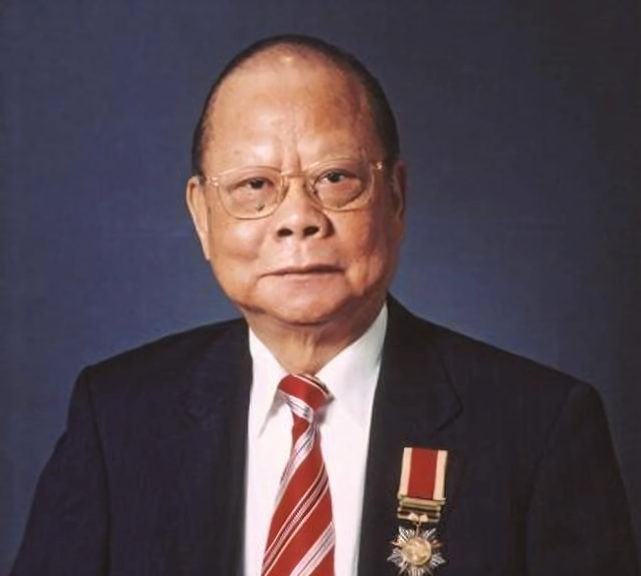 arafed image of a man in a suit and tie with a medal, ren heng, bao pham, yee chong, kuang hong, lin hsiang, peter chan, dzung phung dinh, bian luan, stanley lau, lim chuan shin, pan ren wei, dao trong le, stanley artger m lau, hua cheng