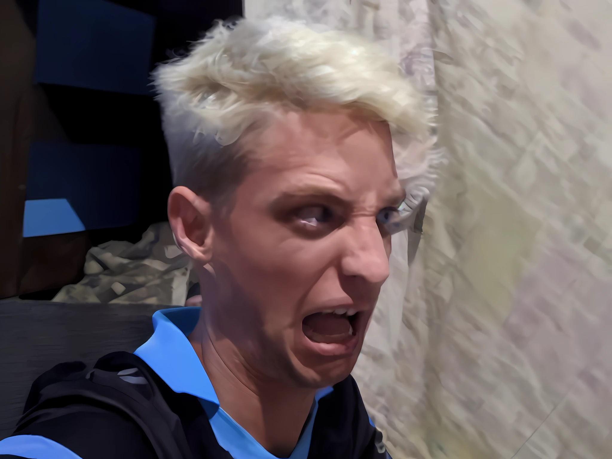 blond haired man with white hair and blue shirt making a face, jerma in a liminal space, he is screaming, insane face, jerma985 in fortnite, scared face, twitch streamer / gamer ludwig, intense screaming expression, screaming at the camera, looks like jerma985, jerma985, jerma 9 8 5