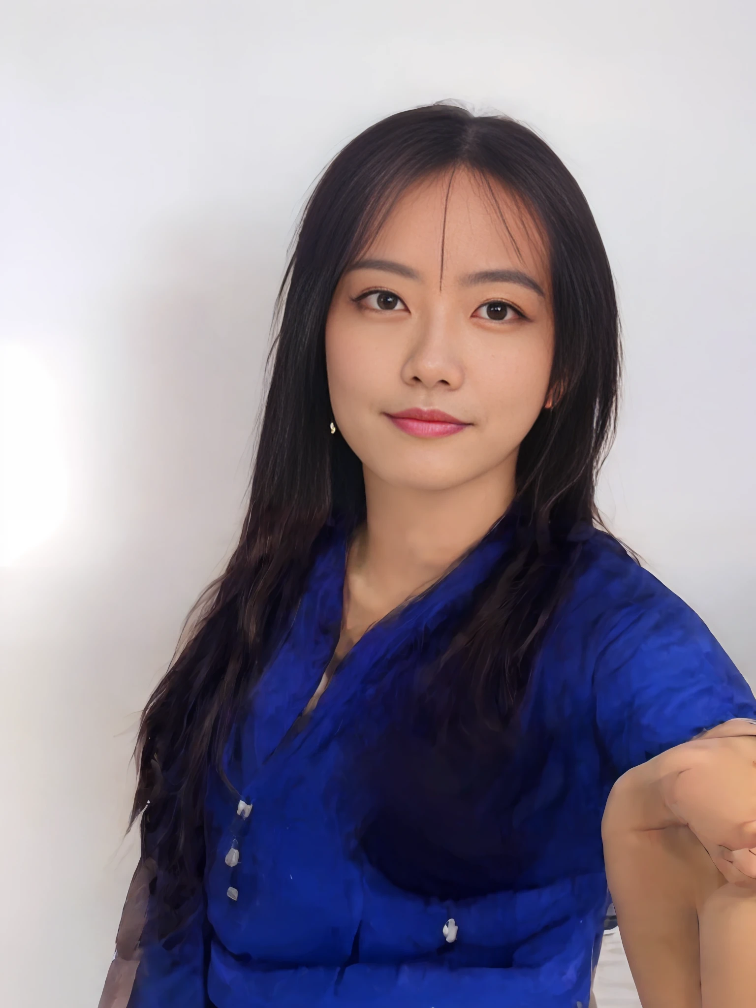 A woman, long black hair, blue shirt, super realistic