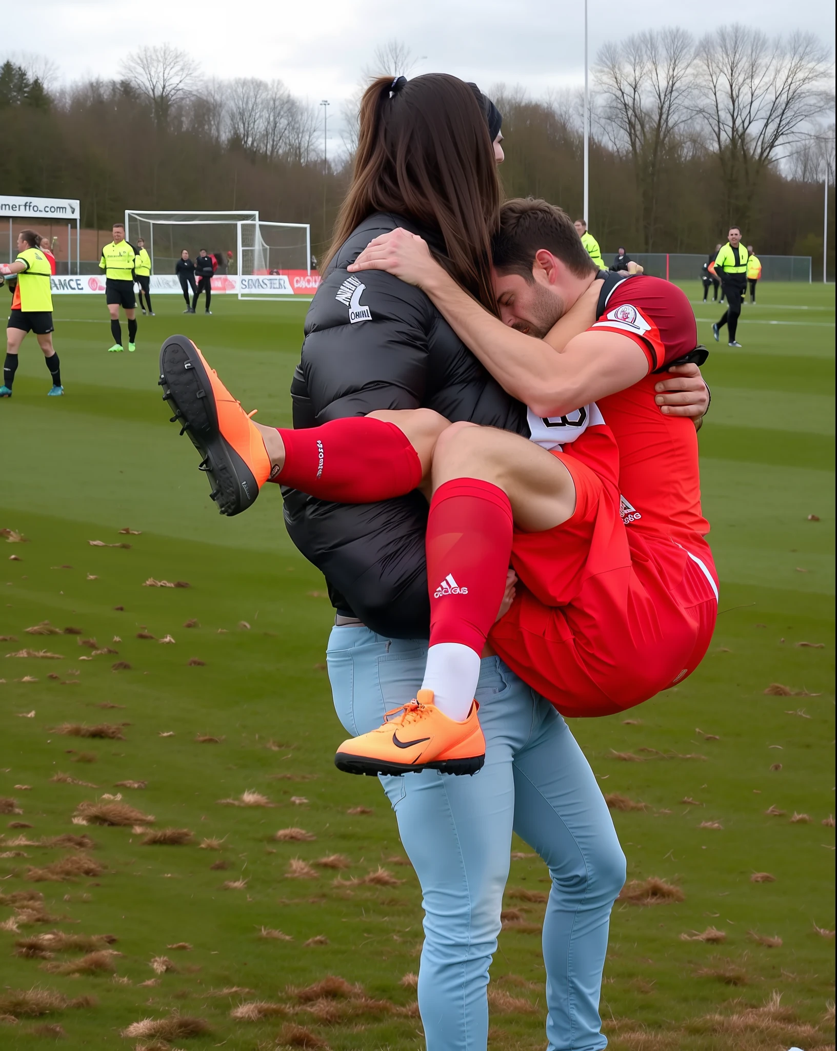 soccer action pose, affection pose, lecherous action pose, dramatic action pose, theatralic pose, there is an attractive woman that is carrying a skinny man, there is a beautiful woman in a shiny coat who is carrying a blond man in her arms, a longhaired beautiful woman in a high-shine black puffy coat, a longhaired woman in a shiny downcoat, a woman is carrying a shorthaired man who is wearing shorts and a t-shirt, a weak man in spots shorts is consciousless and needs to be carried, a shorthaired man with closed eyes is carried in the arms of a longhaired woman, a woman looks very scared and terrified, a consciousless man with closed eyes is suffering very much and has a very painful face, photo, photo shoot, photographed , accident, help, aid, first aid, pity, there is a woman holding a fallen sportsman in her arms on a field, celebration, celebrating, elliot alderson, proud looking, celebrate goal, edited, hugging, hugging his knees, end of an era, very emotional, hugging her knees, stunningly beautiful, hug, very sad, award winning shot, looking happy, hugs, very very happy!, paul heaston