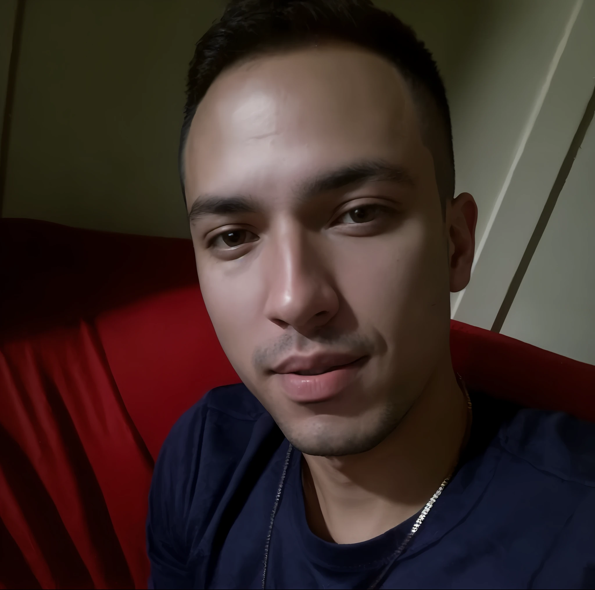 Man sitting on a red sofa, around 1 9 years, Andres Rios, 2 7 years, 2 8 years, 2 9 years, 2 3 years, about 3 5 years, 2 4 years, José Moncada, profile picture, 3 2 years, profile picture, profile picture