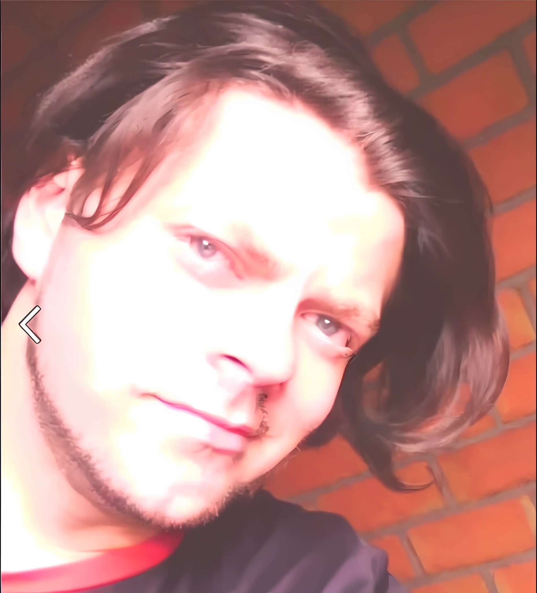 there is a man with a long hair and a black shirt, twitch streamer / gamer ludwig, andreas m wiese, michal, very very low quality picture, headshot profile picture, profile picture 1024px, taken in the early 2020s, taken in the late 2000s, profile photo, profile image, uploaded --auto --s2