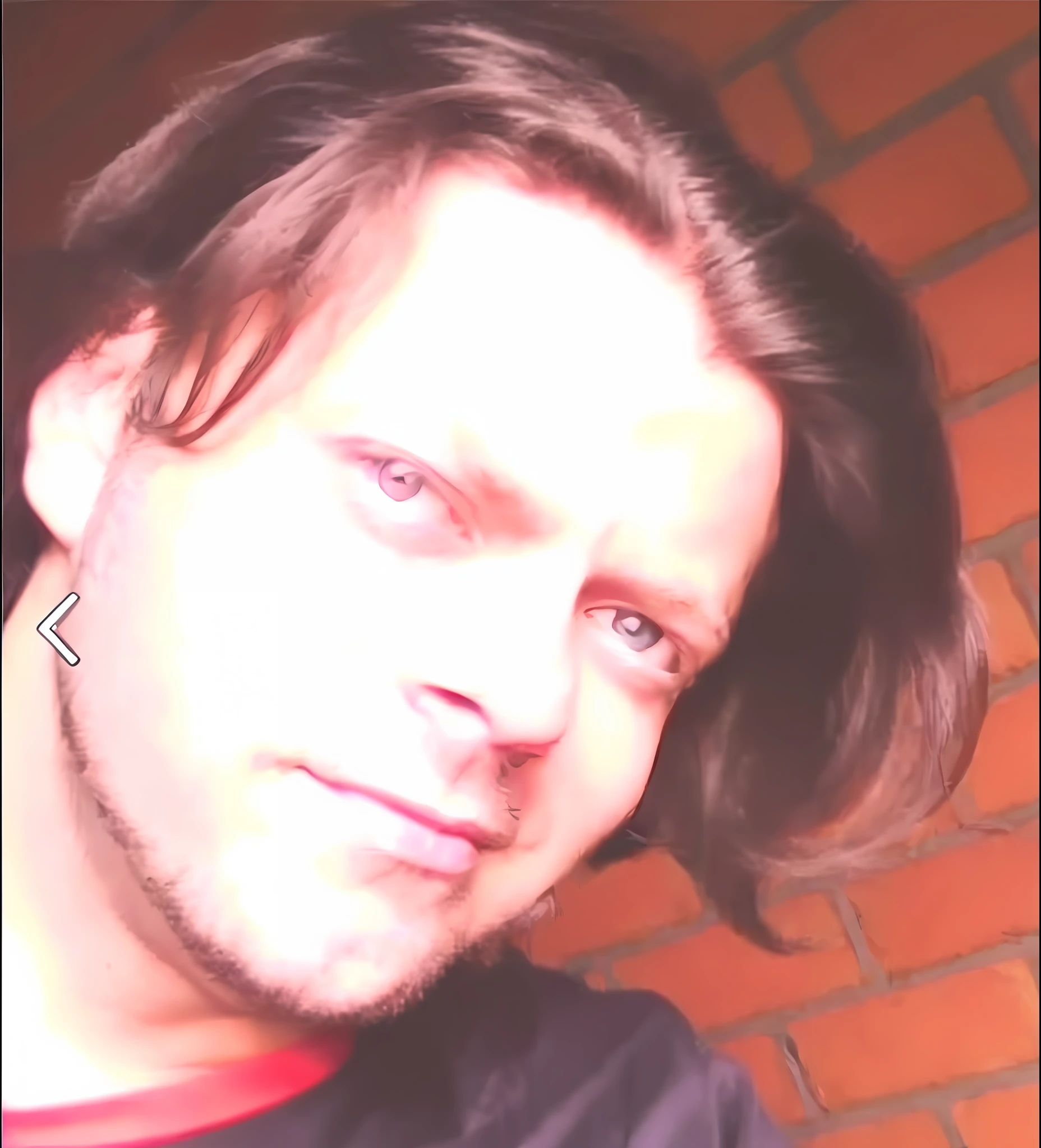 there is a man with a long hair and a black shirt, twitch streamer / gamer ludwig, andreas m wiese, michal, very very low quality picture, headshot profile picture, profile picture 1024px, taken in the early 2020s, taken in the late 2000s, profile photo, profile image, uploaded --auto --s2