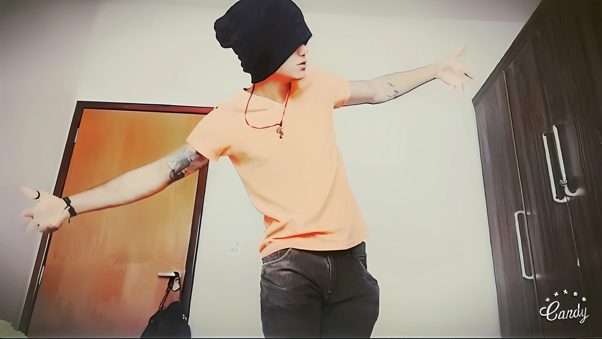 there is a man with a hat on standing in a room, baggy clothing and hat, wearing a baggy, androgynous person, wearing an orange t shirt, his arms spread. ready to fly, androgynous, he is wearing a hat, male ulzzang, lil peep, wearing an orange t-shirt, androgynous male --auto --s2