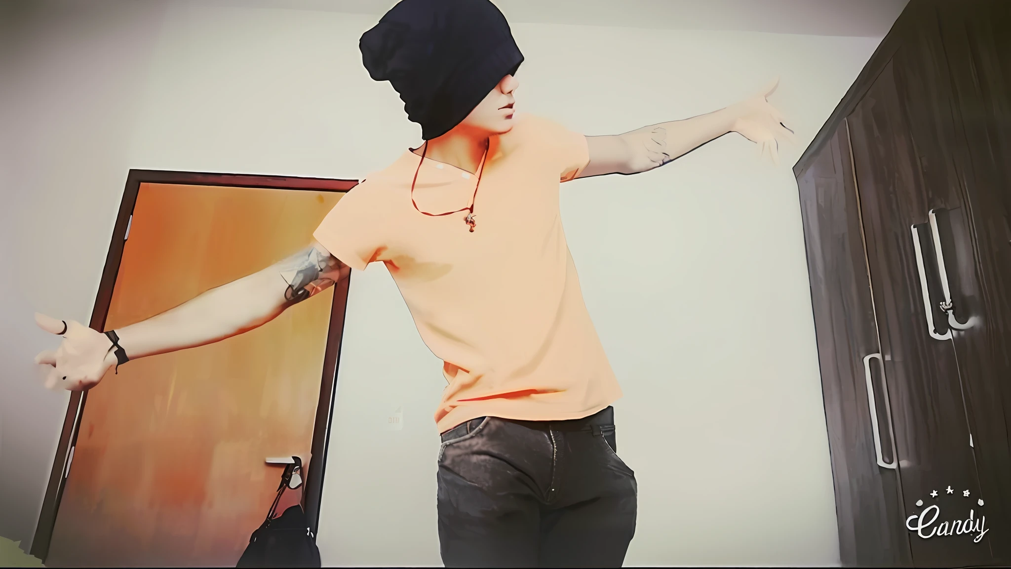 there is a man with a hat on standing in a room, baggy clothing and hat, wearing a baggy, androgynous person, wearing an orange t shirt, his arms spread. ready to fly, androgynous, he is wearing a hat, male ulzzang, lil peep, wearing an orange t-shirt, androgynous male --auto --s2