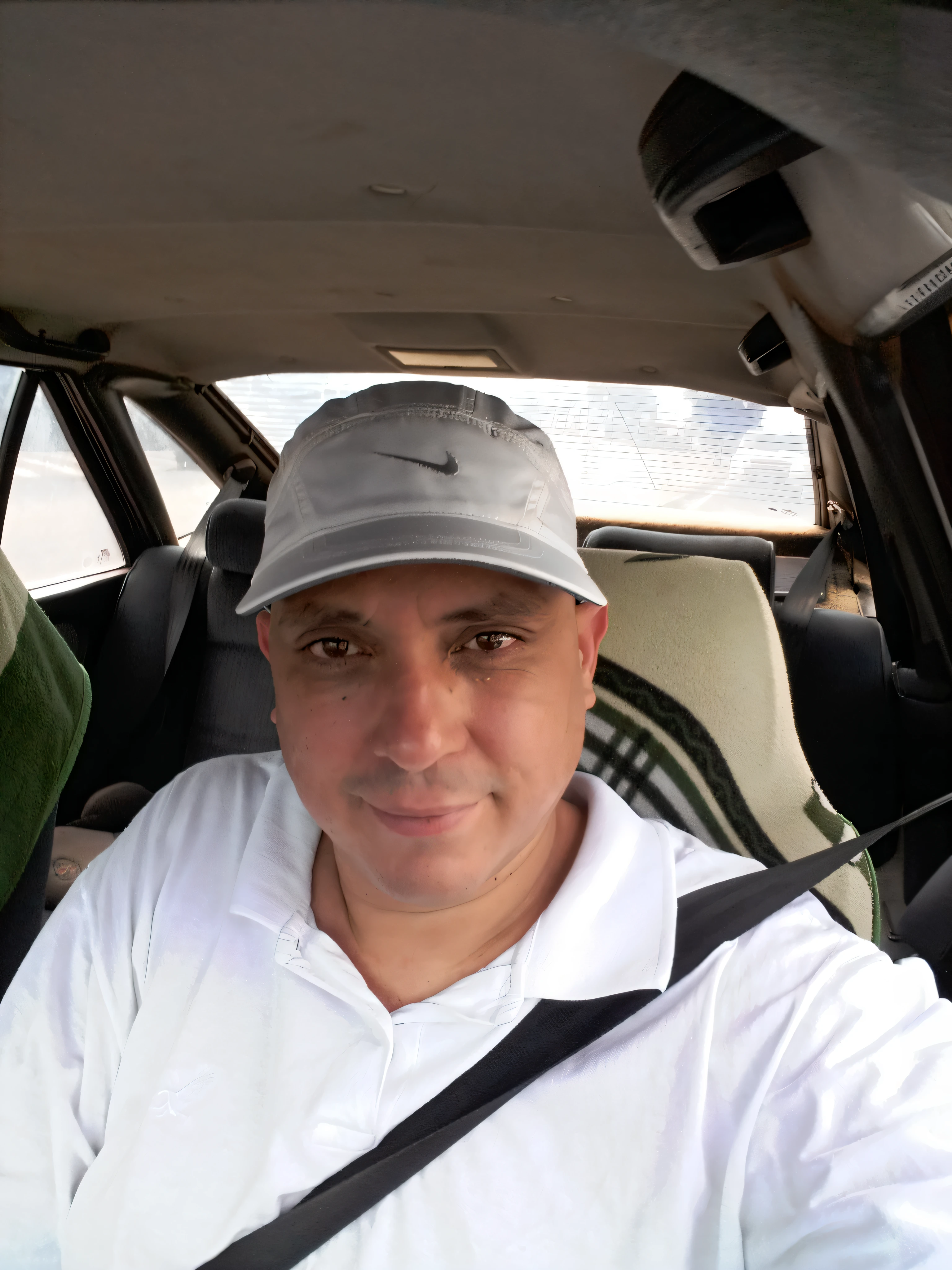 There is a man sitting in a car with a hat, in Egypt, about 3 , Amr Elshamy, Mohamed Chahin, in Giza, Ahmad Merheb, from Egypt, selfie photo, Encho Enchev, Khyzyl Saleem, ATEF, Ted Nasmit, driving a car, POV photo, photo, driving(nsfw:1.5),verybadimagenegative_v1.3, ng_deepnegative_v1_75t, (ugly:0.8), stubs,(worst quality:2), (low quality:2), (normal quality:2), low resolution, normal quality, ((monochrome)), ((grayscale)), skin blemishes, acnes, skin blemishes, bad anatomy, DeepNegative, back, tilted head, {Multiple people}, lowres, bad anatomy, bad hands, text, error, missing fingers, extra digit, fewer digits, cropped, worst quality, low quality, normal quality, jpegartifacts,  signature, watermark, username, blurry, bad feet, cropped, badly drawn hands, badly drawn face, mutation, deformed, worst quality, low quality, normal quality, jpeg artifacts, signature, watermark, extra fingers, fewer digits, extra limbs, extra arms, extra legs, malformed limbs, fused fingers, many fingers, long neck, squint, mutant hands, polar lowres,bad body, bad proportions,  coarse proportions, text, error, lack of fingers, lack of arms, lack of legs, extra digit, extra arms, extra leg, extra foot, ((repeating hair))