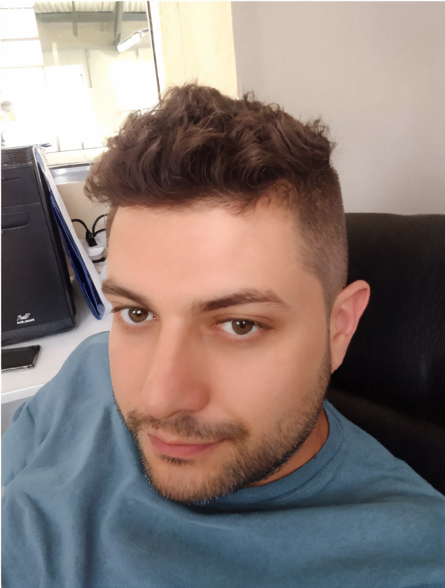 arafed man with a beard and a blue shirt sitting in a chair, twitch streamer / gamer ludwig, with a small beard, reddit post, short stubble, inspired by Antônio Parreiras, about 3 5 years old, small beard, emanuele dascanio, frontal picture, short beard, shaven stubble --auto --s2