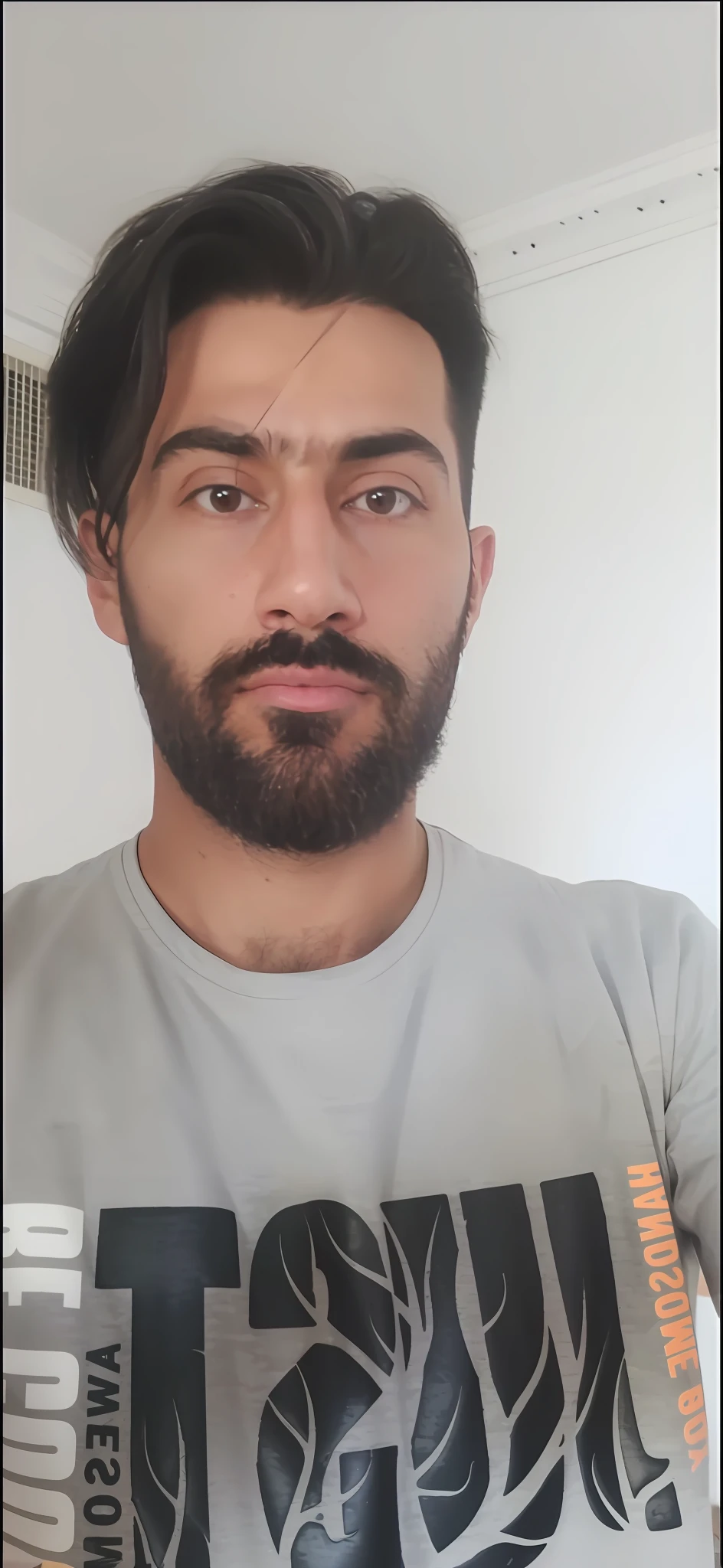 arafed man with a beard and mustache wearing a t - shirt, with a small beard, without beard and mustache, without beard, very very low quality picture, 2 7 years old, 2 9 years old, 2 8 years old, 8k selfie photograph, small beard, 3 2 years old, around 1 9 years old, an afghan male type
