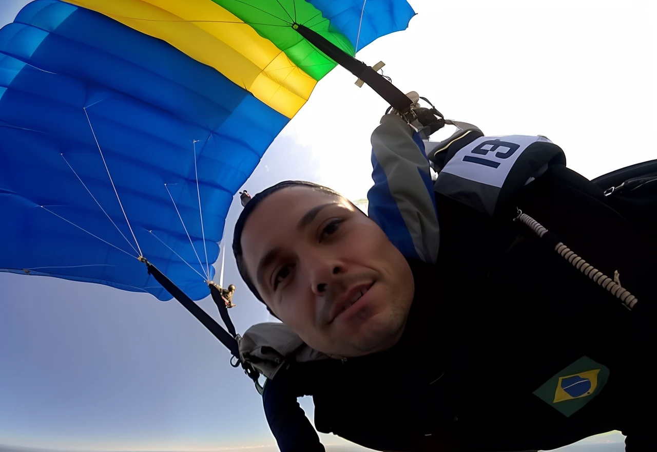 Arafed man with a parachute in the sky with a flag, skydiving, flying towards the camera, a man floats in the air, aerial view, profile picture, flying in the air, karolina cummings, benjamin netanyahu skydiving, bottom up view, bottom view, caroline gariba, petrovic mine, pov shot, seen from below