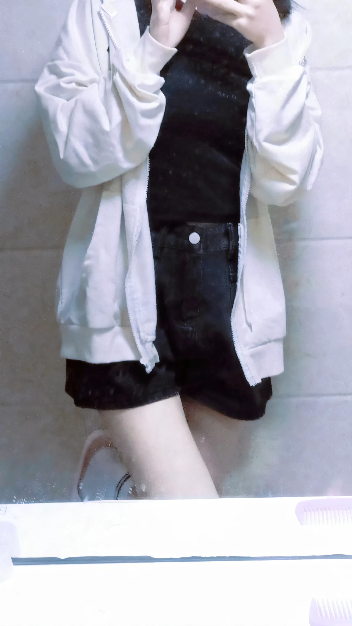 there is a woman taking a selfie in the mirror, casual clothes, outfit photo, white clothes, ( ( ( wearing jeans ) ) ), white and black clothing, black and white clothes, wearing casual clothes, in white clothes, simple clothes, white jacket, white trendy clothes, wearing black shorts, casual white garment, ulzzang, white fluffy cotton shorts