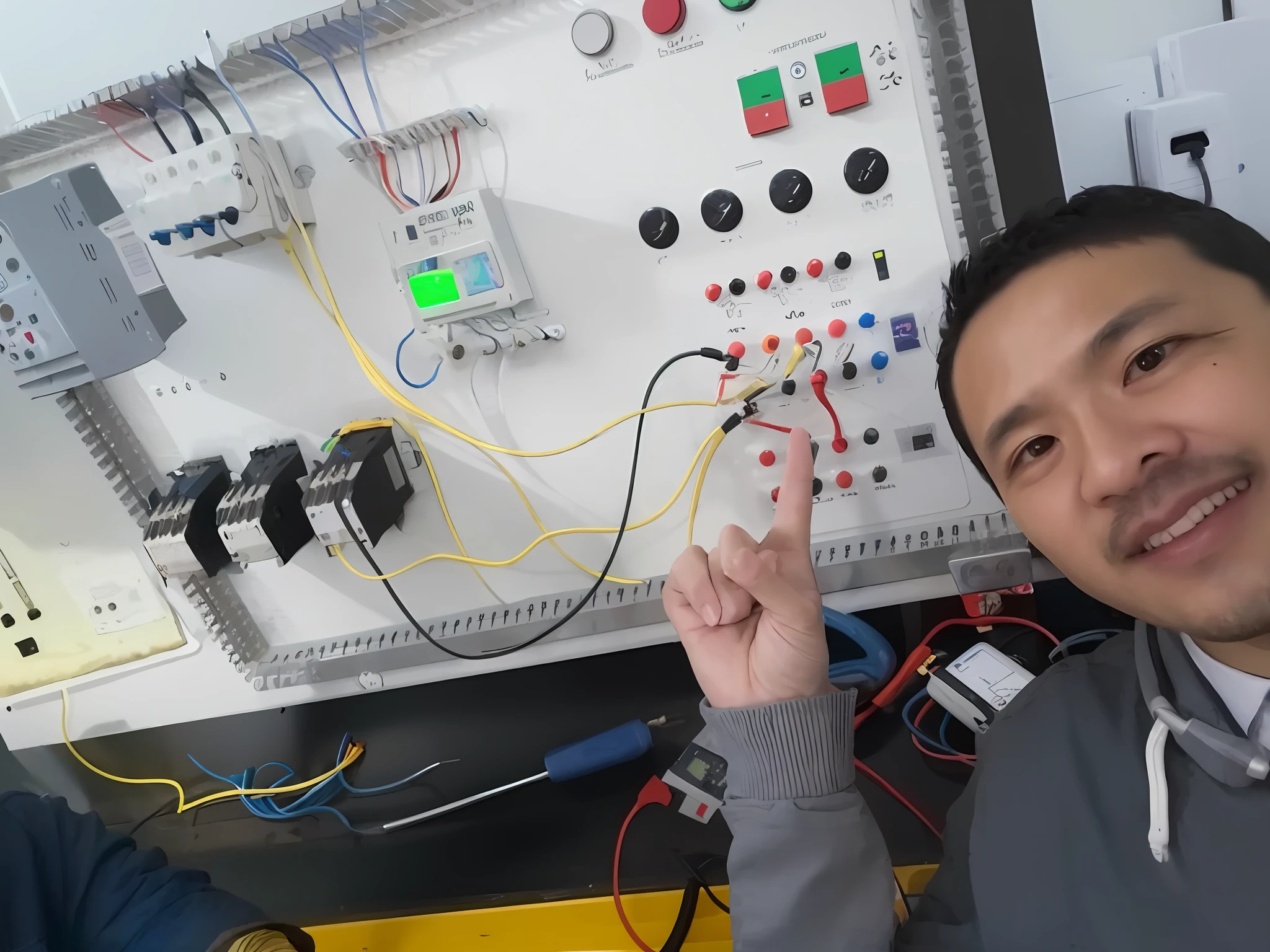 there are two chinese men who is pointing at something,catching fire,fire,electrical, wiring, electrical wiring!, electrical details, engineering bay, electrical signals, complicated circuits and wires, electronic circuits, engineering, circuits, technical environment, electrical arcs, circuits, in an advanced laboratory, technical, fusion, professional work, highly technical, in a workshop, circuit, electricity,