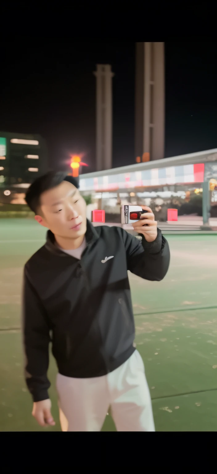 there is a man standing in a parking lot holding a cell phone, low quality video, chinese artist, tiktok video, night time footage, very very low quality, low quality footage, youtube video screenshot, live footage, iphone video, baotou china, zeng fanzh, yanjun chengt, shot on gopro9, zmonzheng, from china --auto