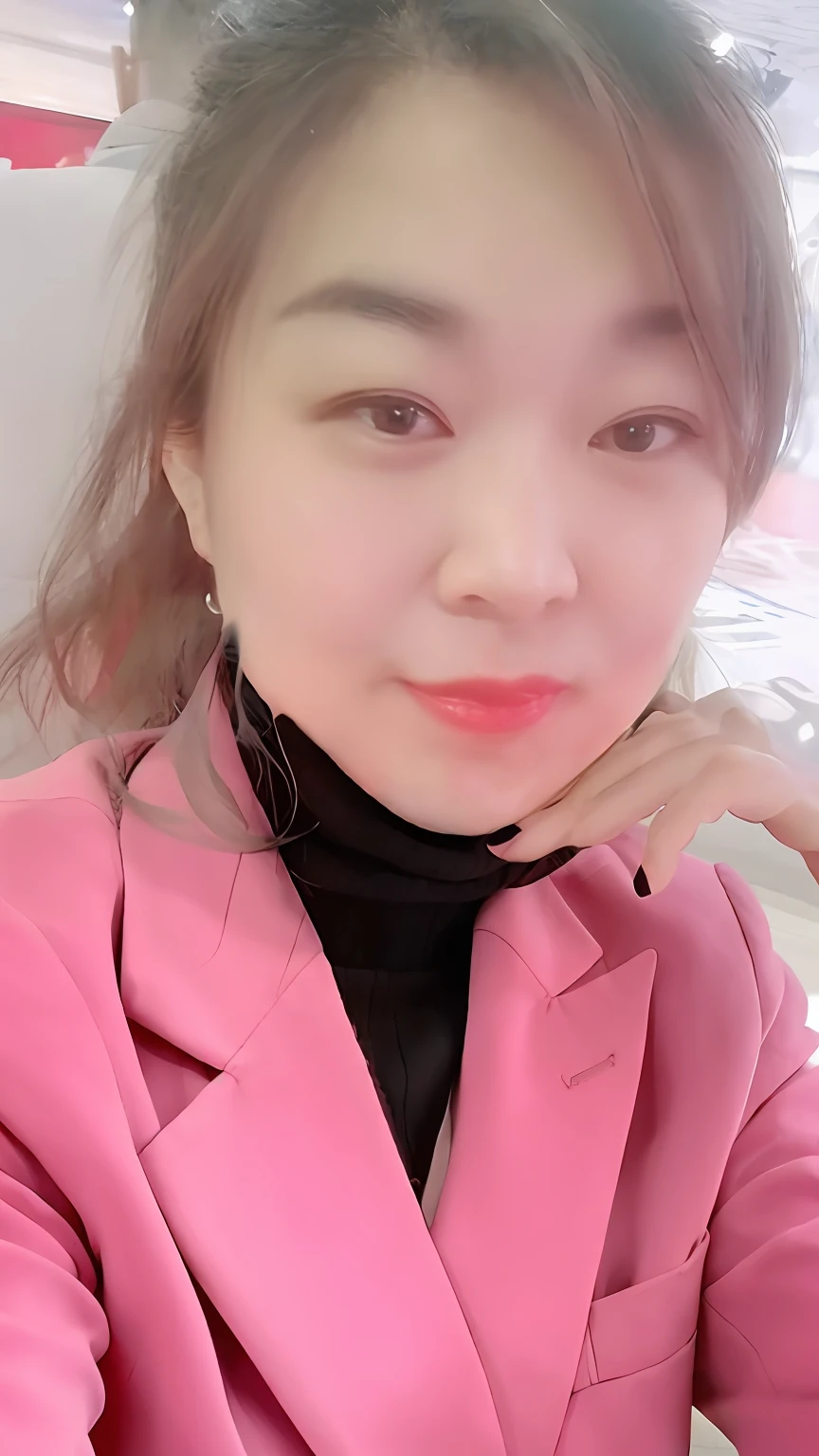 Pink blazer with black turtleneck