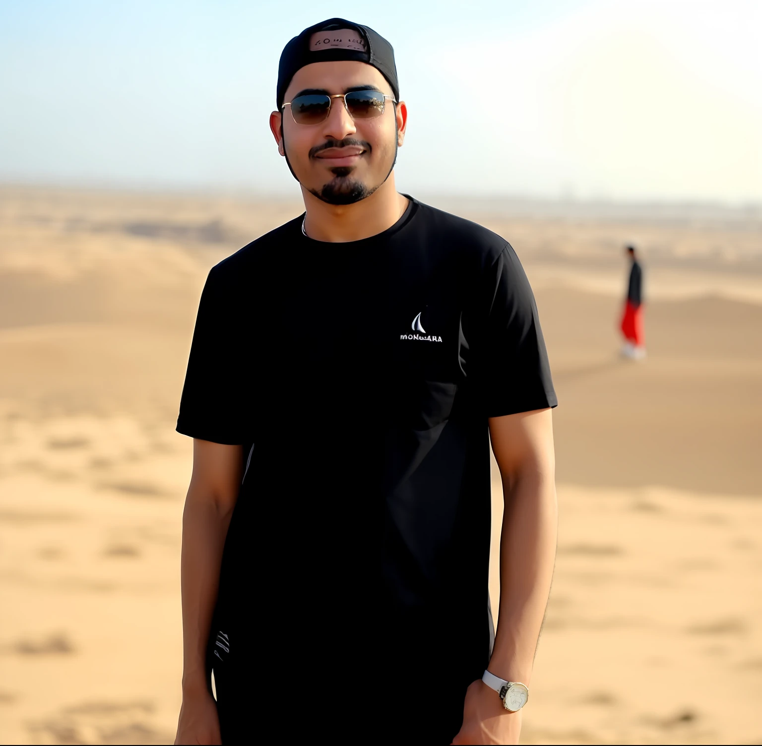 Omar takes a picture in Makka Mokarama's Harrak with Islamic clothing