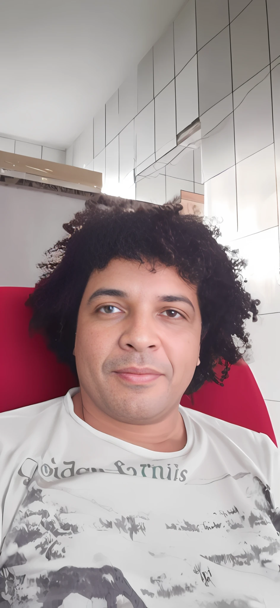 there is a man with a curly hair sitting in a chair, with afro, edu souza, east african man with curly hair, mohamed chahin, david rios ferreira, a black man with long curly hair, curly afro, black man with afro hair, 4 0 years old man, icaro carvalho, inspired by Candido Bido