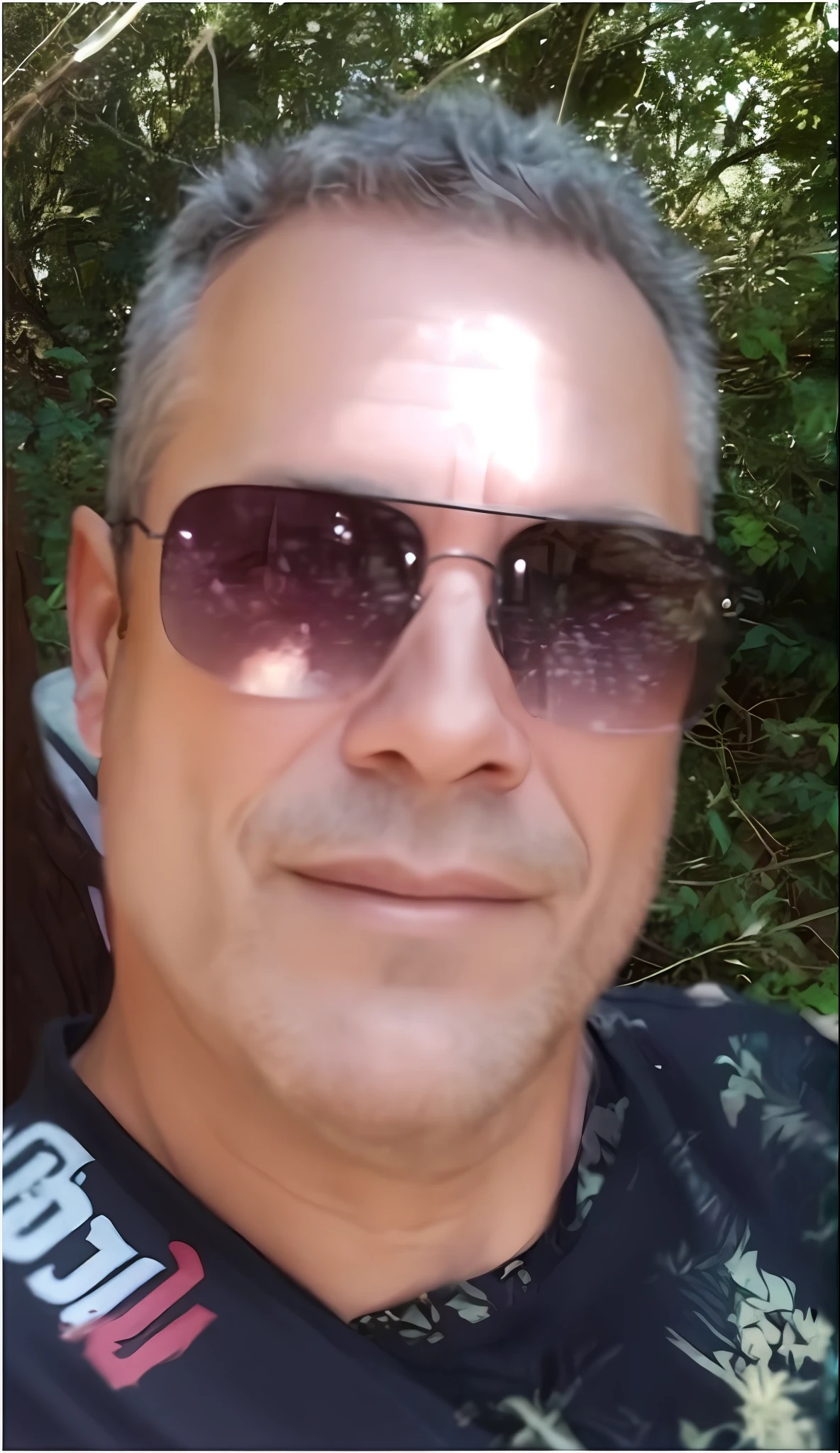 Best Category: "Stunning male portrait of a 45-year-old white man wearing sunglasses and an elegant black shirt"