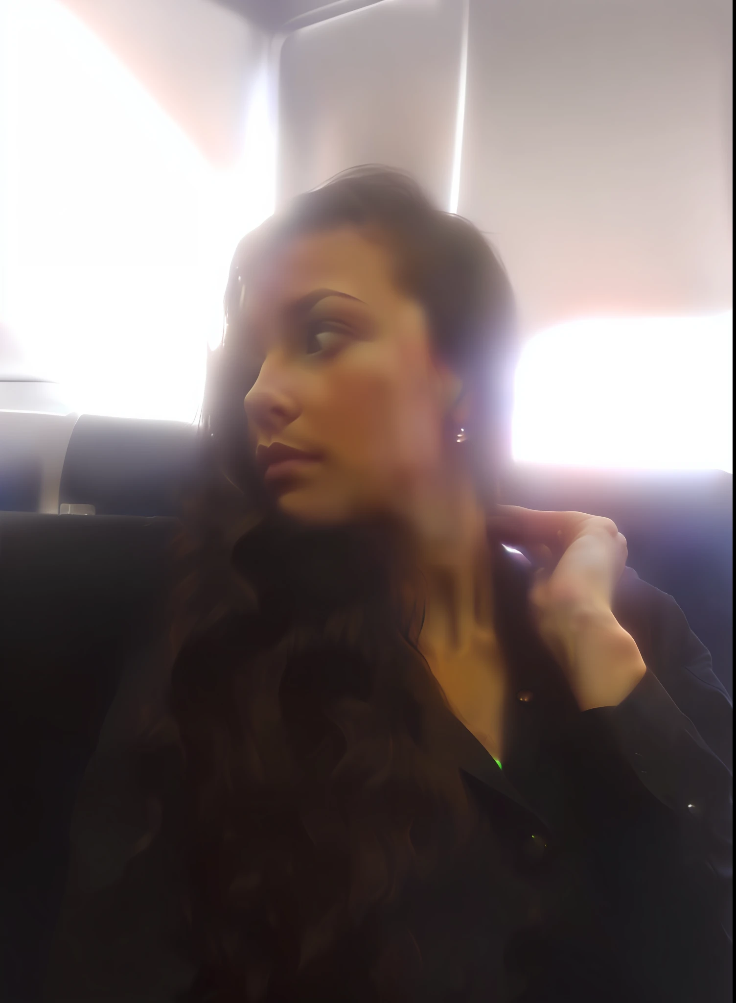 there is a woman with long hair sitting in a chair, looking to the side off camera, looking away from camera, looking away from the camera, looking from side!, looking off to the side, looking sideway, sat down in train aile, in the air, slightly blurred, very very low quality picture, doing an elegant pose, profile posing