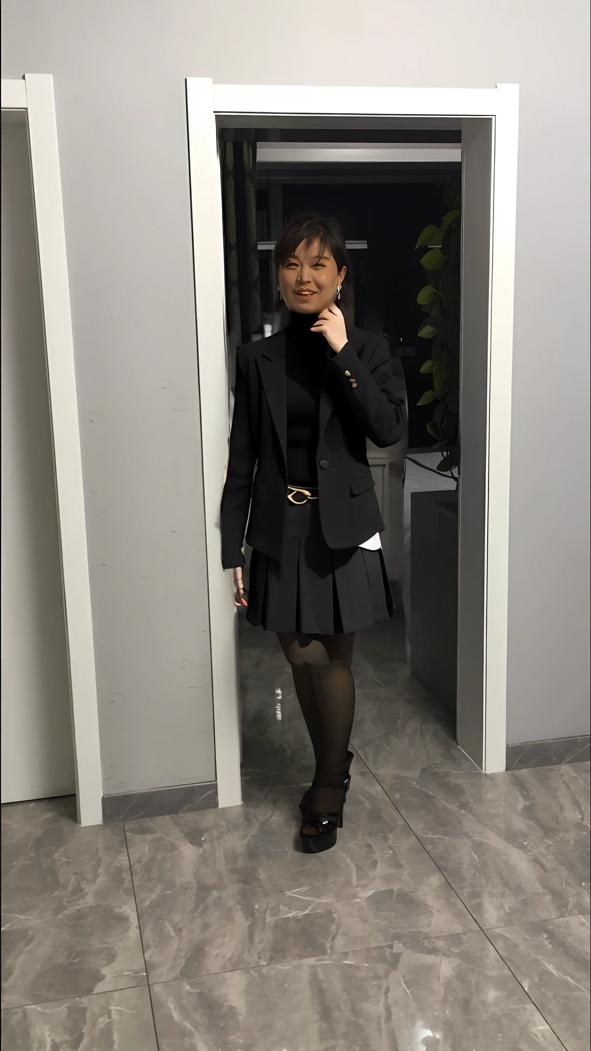 Black blazer, black turtleneck sweater, black step skirt