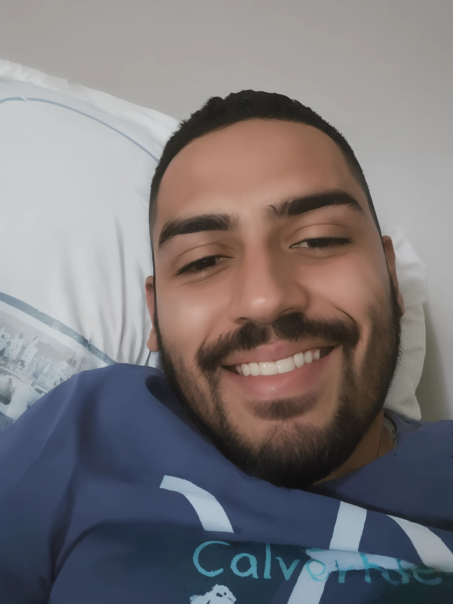 arafed man laying in bed with a pillow and a pillow case, icaro carvalho, caio santos, smiling and looking directly, with a small beard, 2 7 years old, david rios ferreira, happily smiling at the camera, mohamed reda, album photo, ronaldo nazario, headshot profile picture, selfie shot straight on angle, 2 9 years old