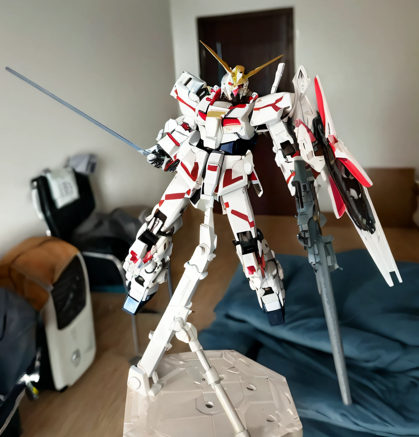 Red and white Gundam robot Arafard model on table, Gundam style, detailed and exquisite, shot with Sony camera, high-quality masterpiece.