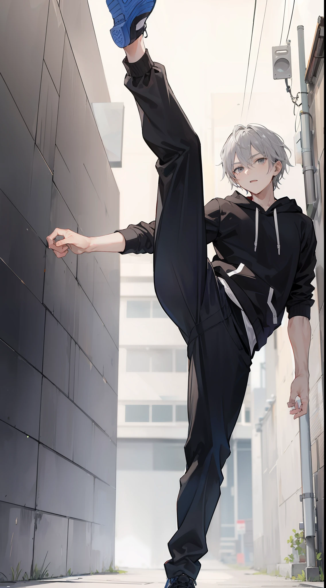 A man, gray haired with gray eyes wearing a black hoodie with black trousers, he is standing on his right foot doing an upward kick