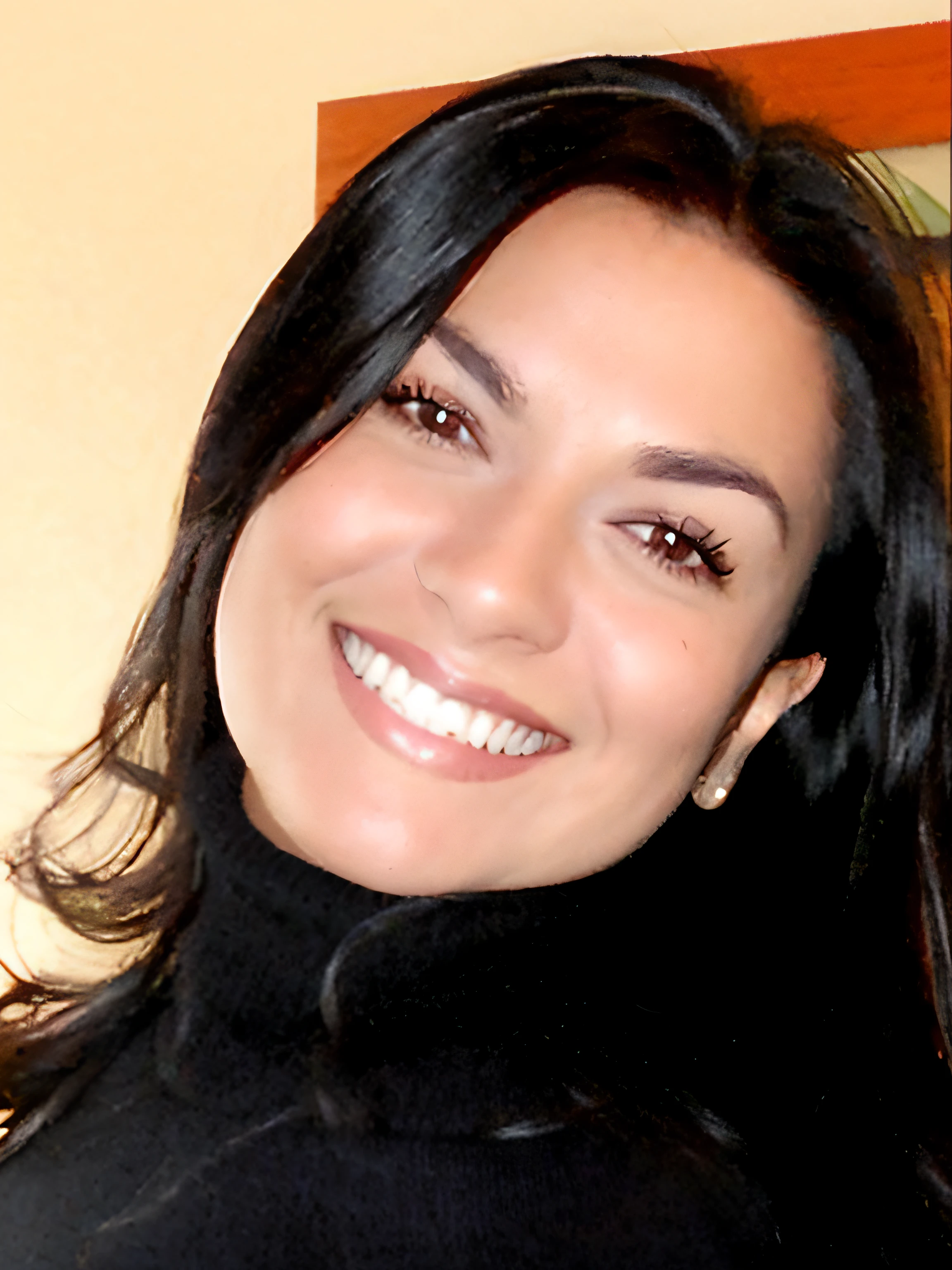 smiling woman with long black hair and a black turtle neck sweater,